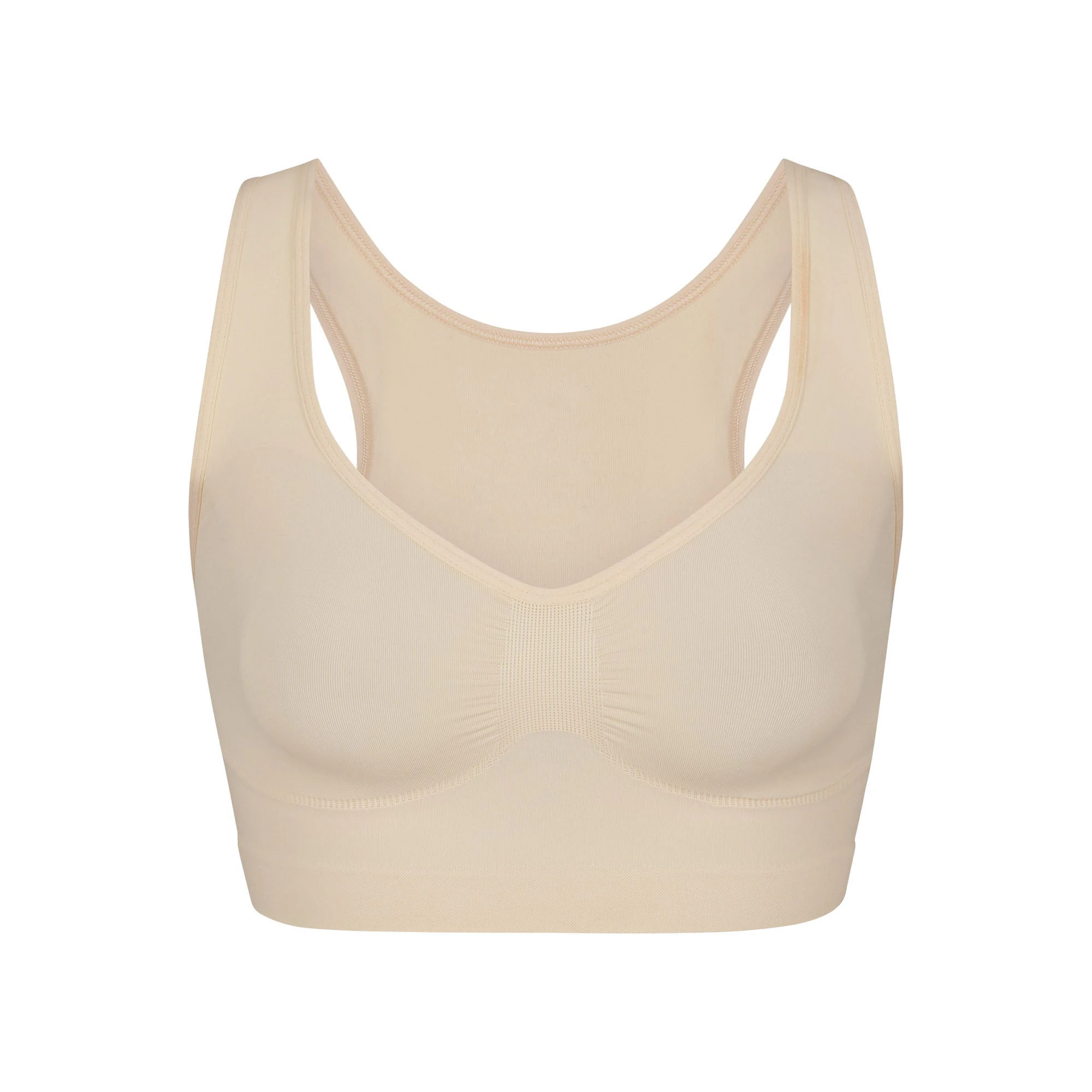 SEAMLESS SCULPT SCOOP PLUNGE BRALETTE LAYS FLAT ON A WHITE BACKGROUND