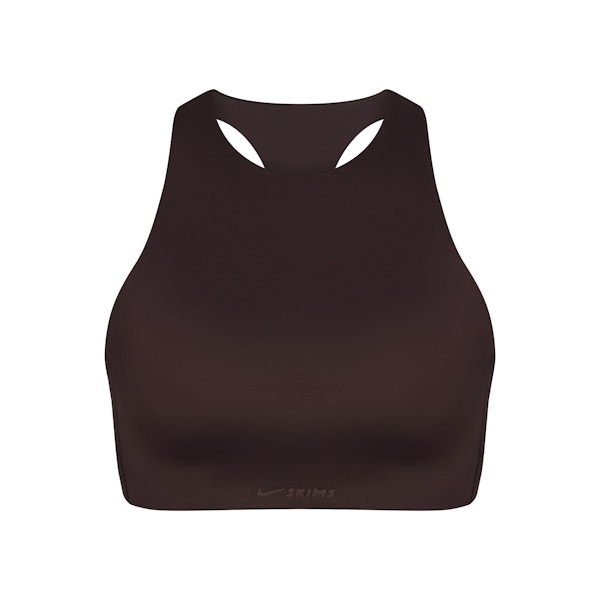 NikeSKIMS SHINE HIGH NECK BRA | PHOENIX FLAT ON A WHITE BACKGROUND | FLT