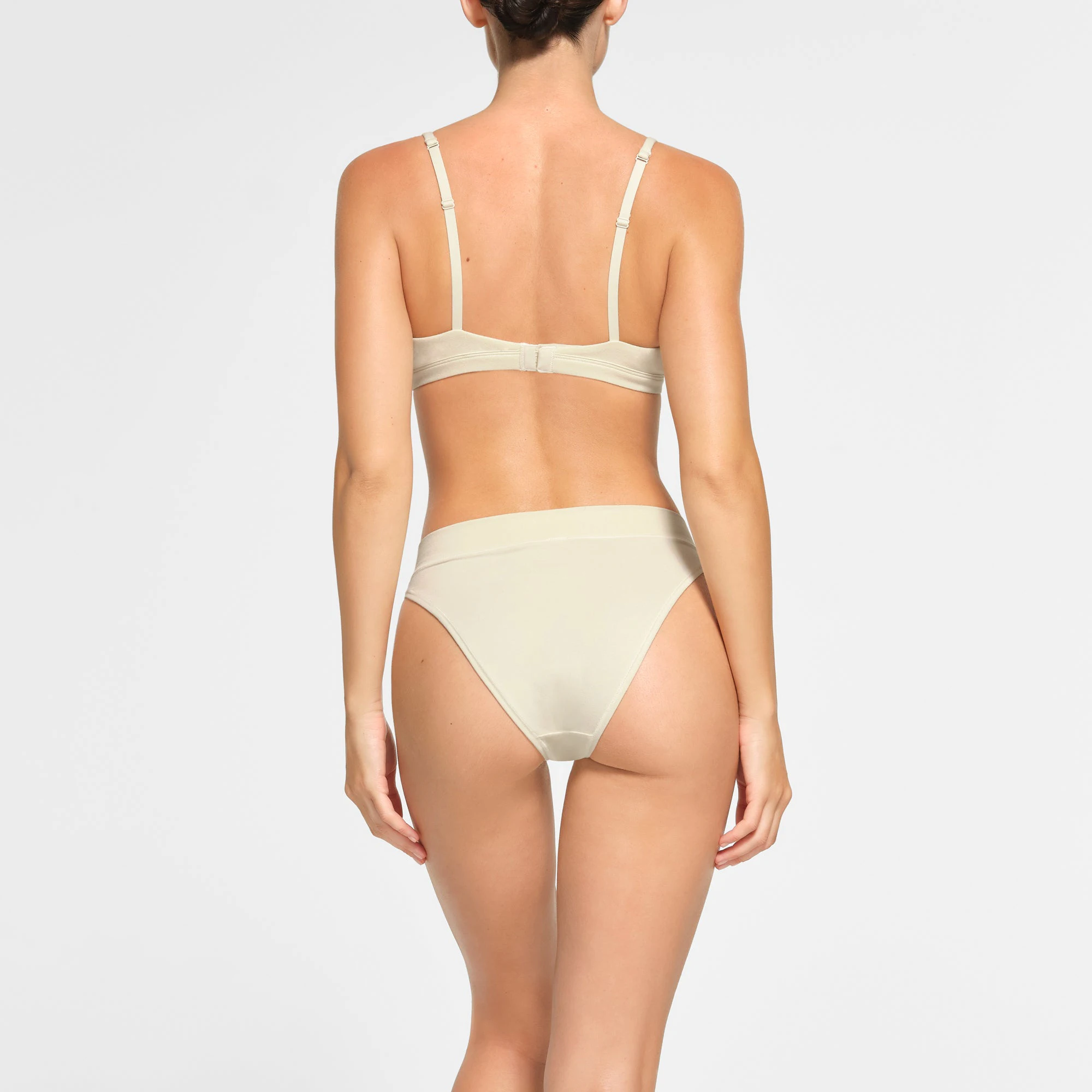 COTTON JERSEY TRIANGLE BRALETTE WORN BY A MODEL IN BACK VIEW