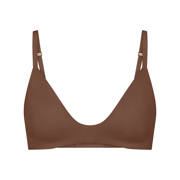 WIRELESS FORM T-SHIRT DEMI BRA | JASPER (DEMI BRAS) LAYS FLAT ON A WHITE BACKGROUND | FLT