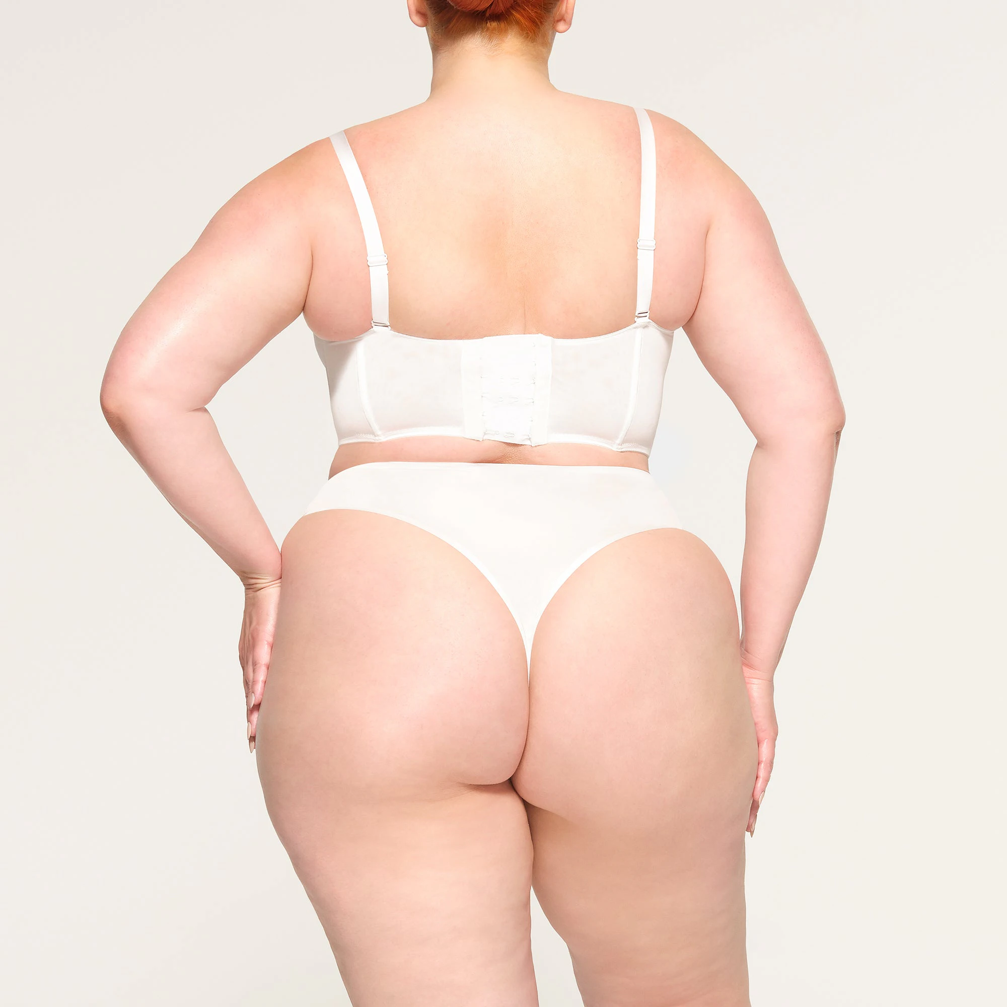 DEMI CORSET BRA ON A MODEL BACK VIEW