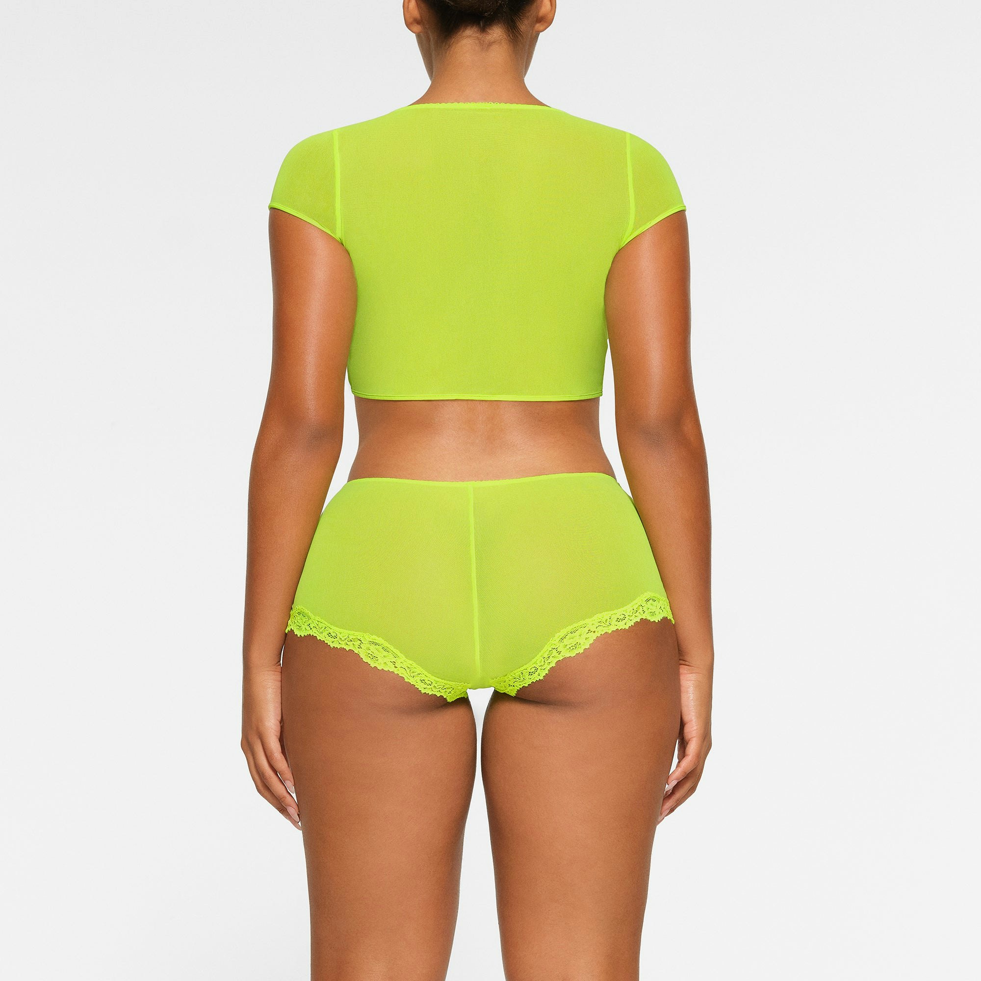 SUMMER MESH SUPER CROPPED TOP WORN BY A MODEL IN BACK VIEW