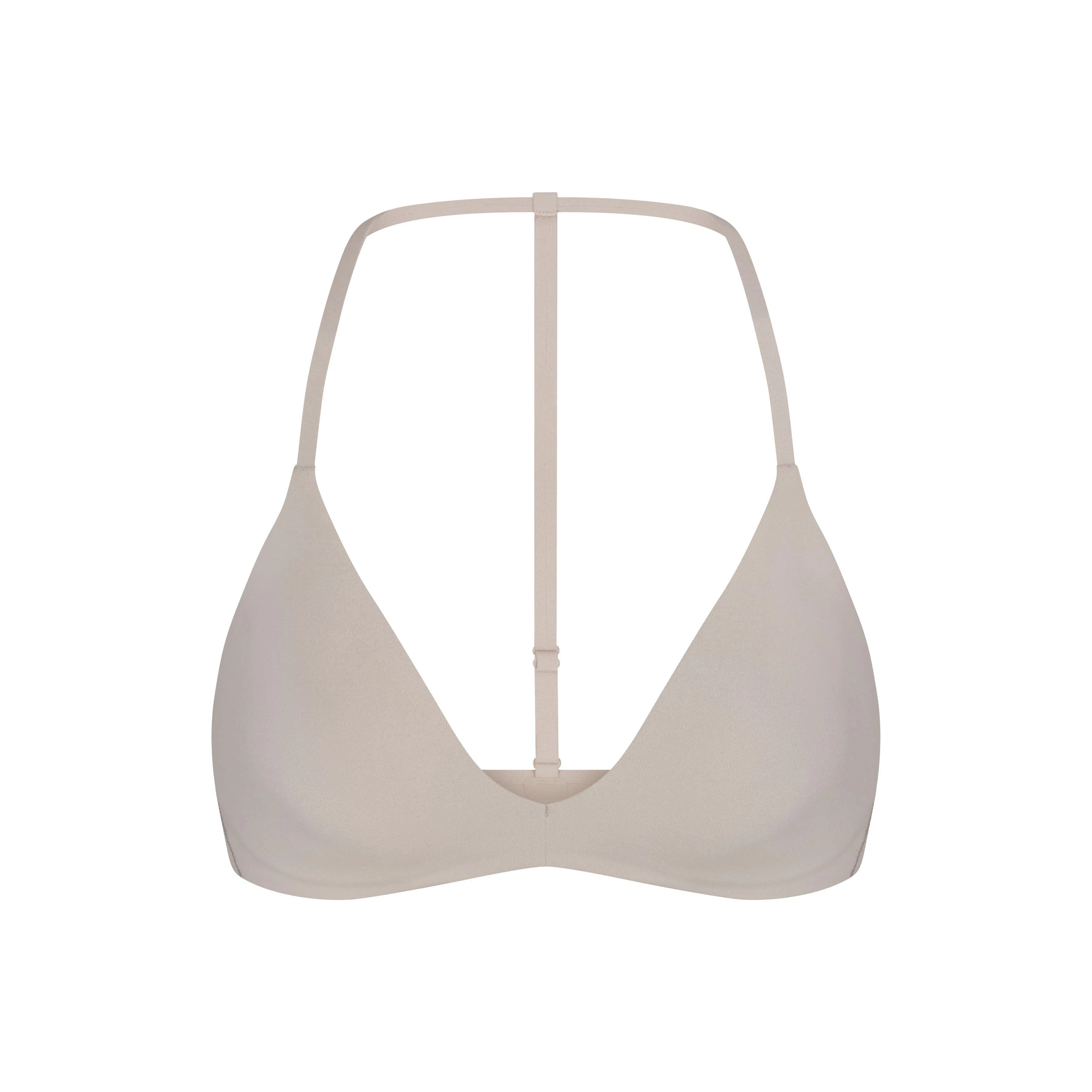 NikeSKIMS STUDIO STRETCH T-BACK TRIANGLE BRA | LINENLAYS FLAT ON A WHITE BACKGROUND | FLT