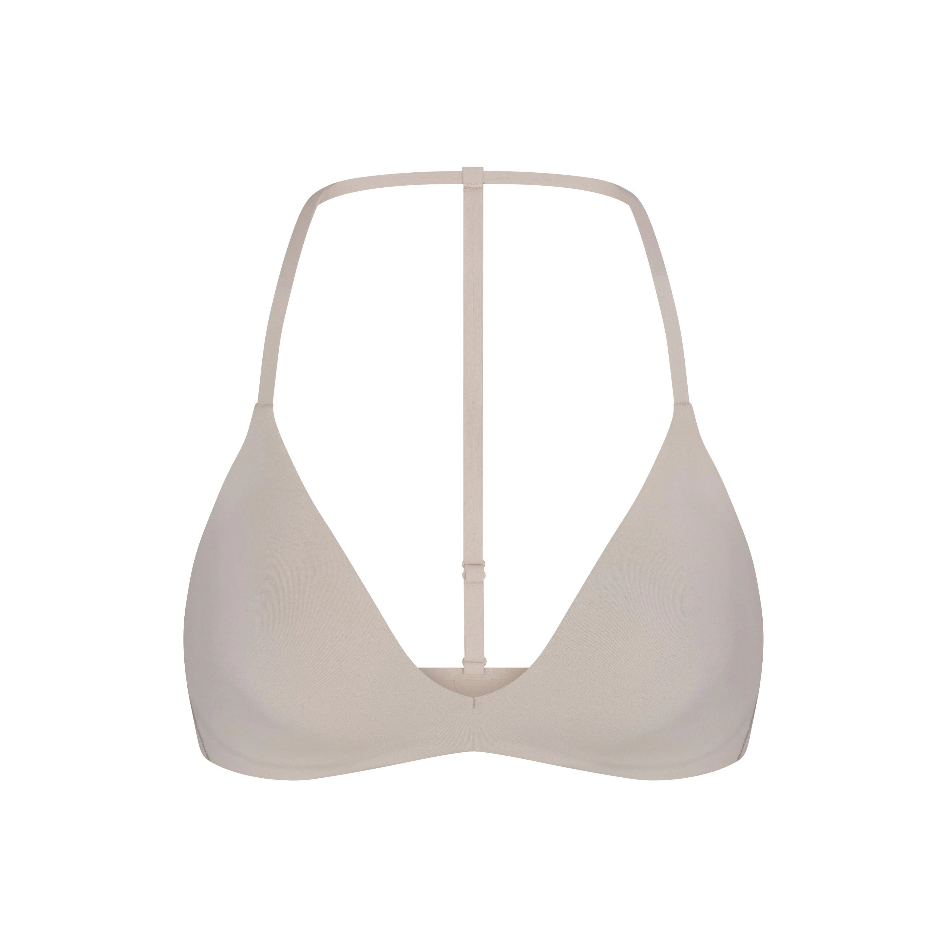NikeSKIMS STUDIO STRETCH T-BACK TRIANGLE BRA | LINENLAYS FLAT ON A WHITE BACKGROUND | FLT