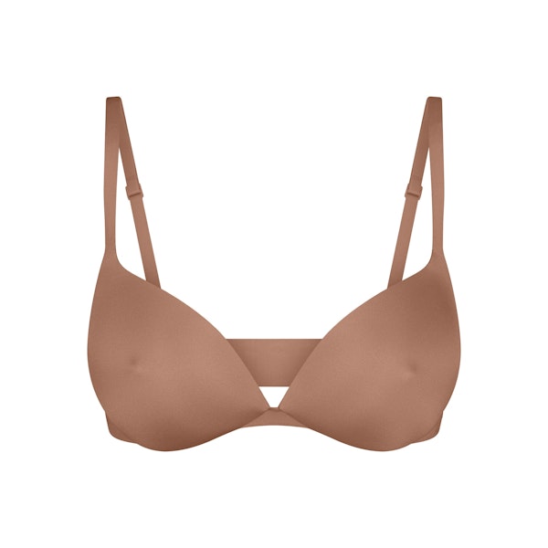 SKIMS ULTIMATE NIPPLE WIRELESS PUSH-UP BRA | SIENNA FLAT ON A WHITE BACKGROUND | FLT