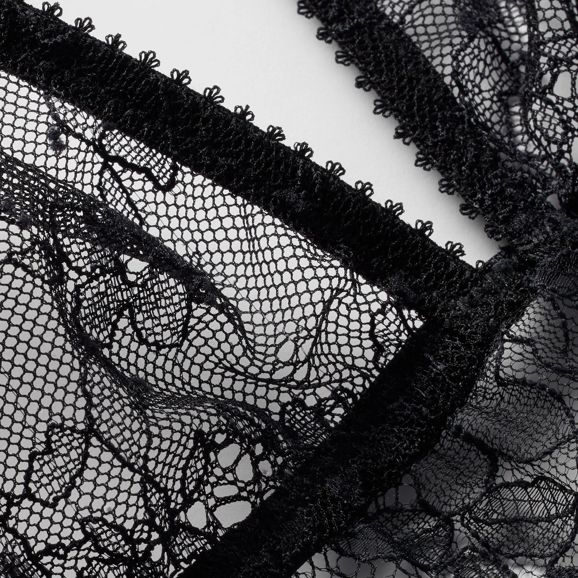 ULTRA FINE LACE BUTTERFLY THONG | ONYX ADDITIONAL FABRIC DETAILS