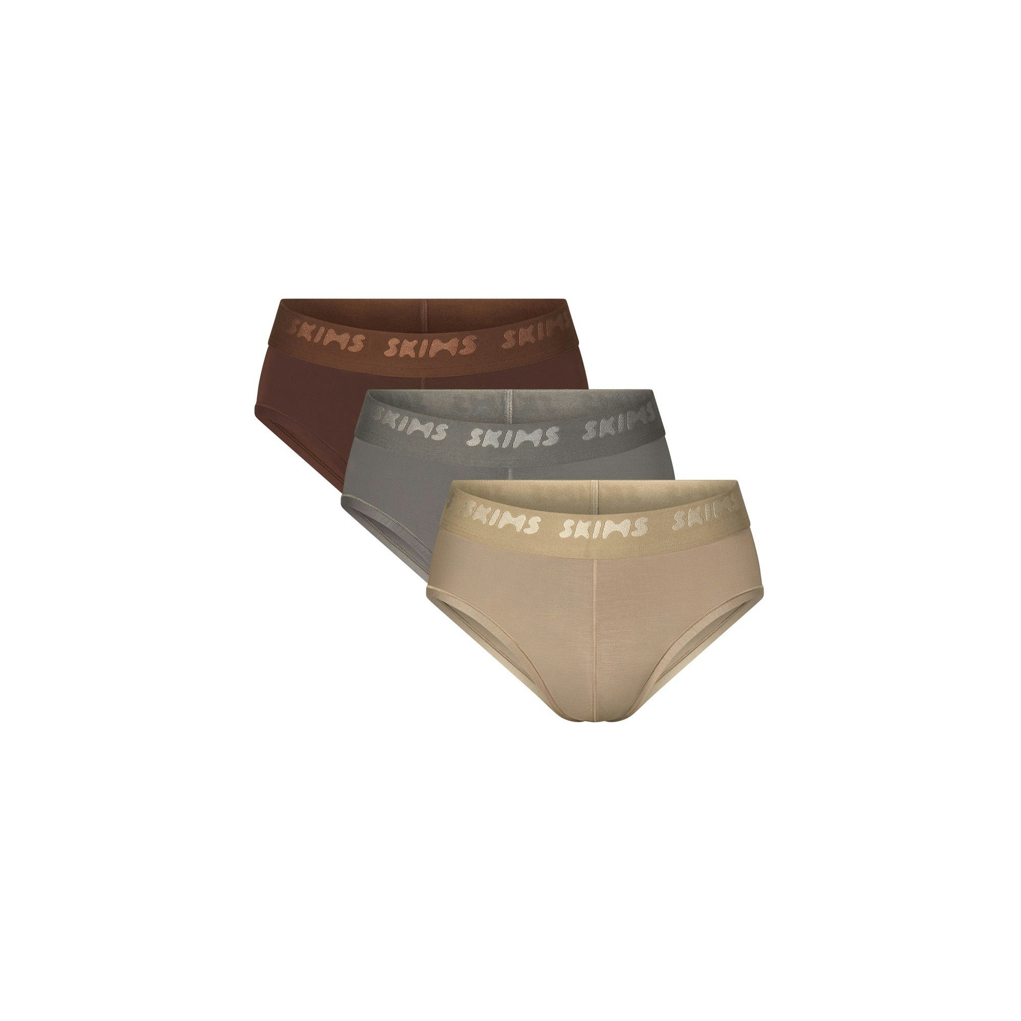SKIMS STRETCH MENS BRIEF 3-PACK | DESERT MULTI (MENS BRIEFS, MENS UNDERWEAR) LAYS FLAT ON A WHITE BACKGROUND | FOCUS: 0.0, 1.0, 0.9