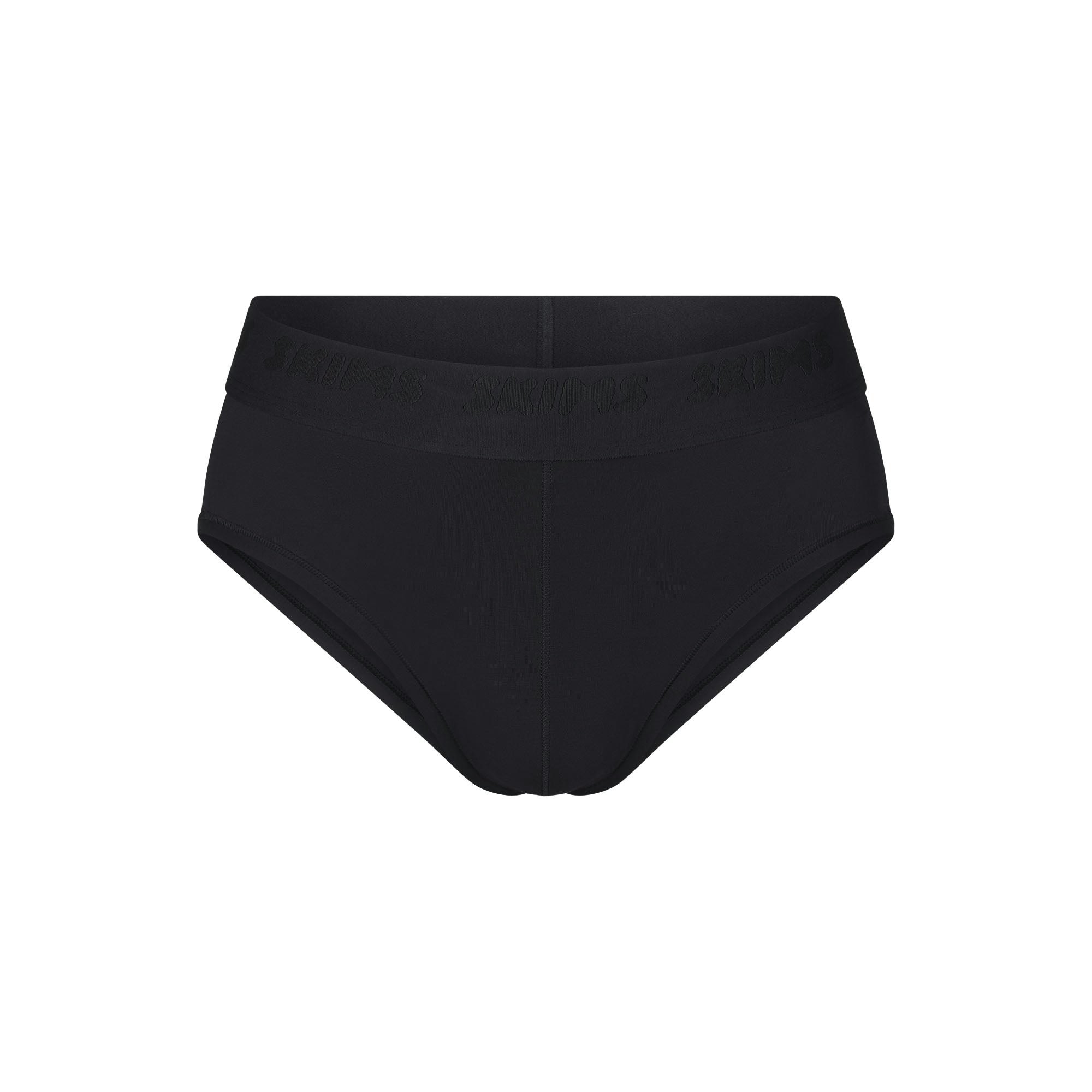 SKIMS STRETCH MENS BRIEF | OBSIDIAN (MENS BRIEFS, MENS UNDERWEAR) LAYS FLAT ON A WHITE BACKGROUND | FLT