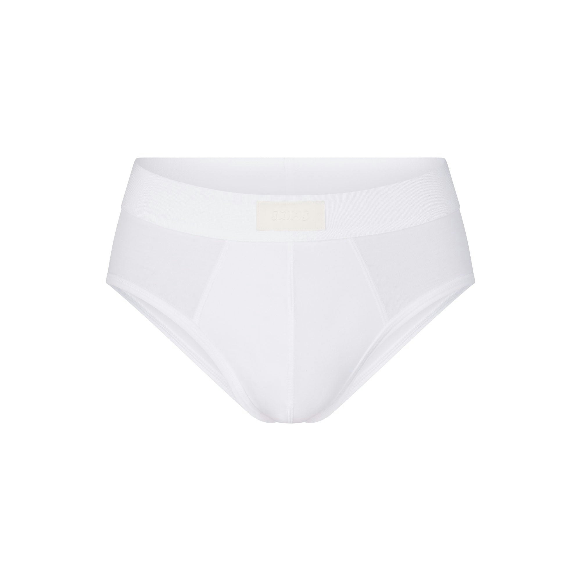 SKIMS COTTON MENS BRIEF | CHALK (MENS BRIEFS, MENS UNDERWEAR) LAYS FLAT ON A WHITE BACKGROUND | FLT