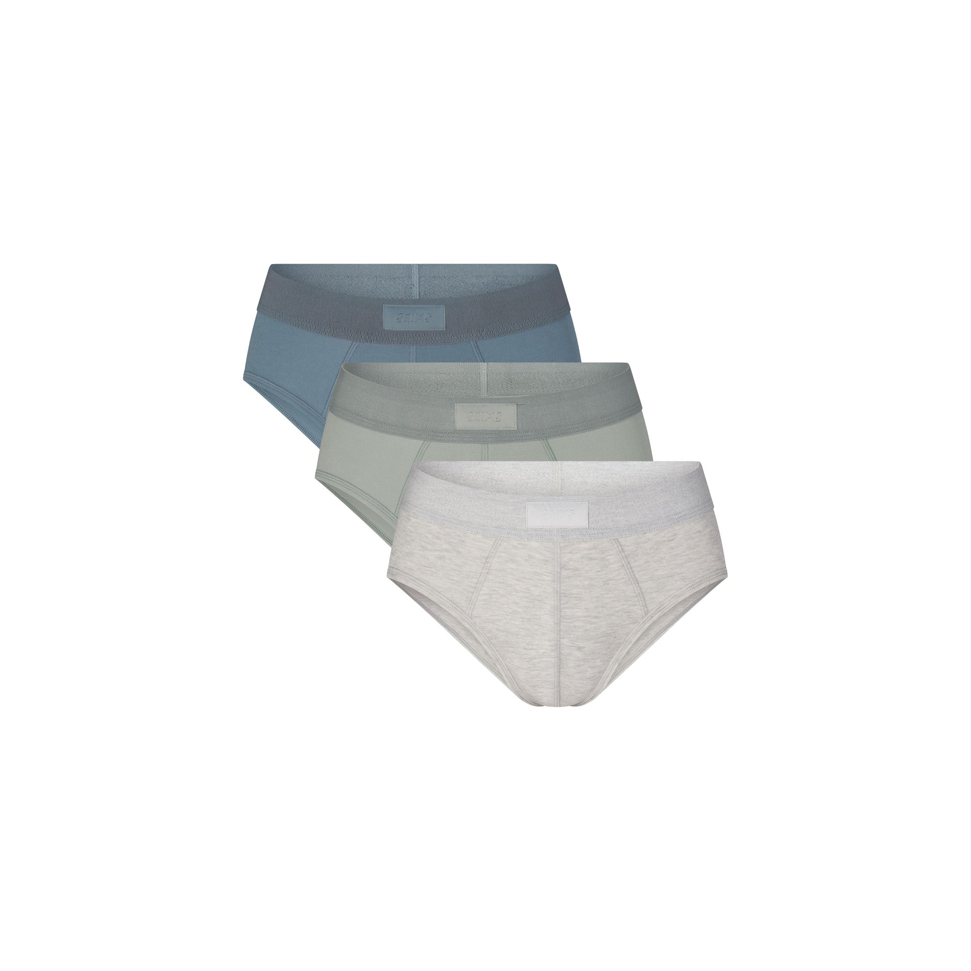 SKIMS COTTON MENS BRIEF 3-PACK | MINERAL MULTI (MENS BRIEFS, MENS UNDERWEAR) LAYS FLAT ON A WHITE BACKGROUND | FLT | FOCUS: 0.0, 1.0, 0.9