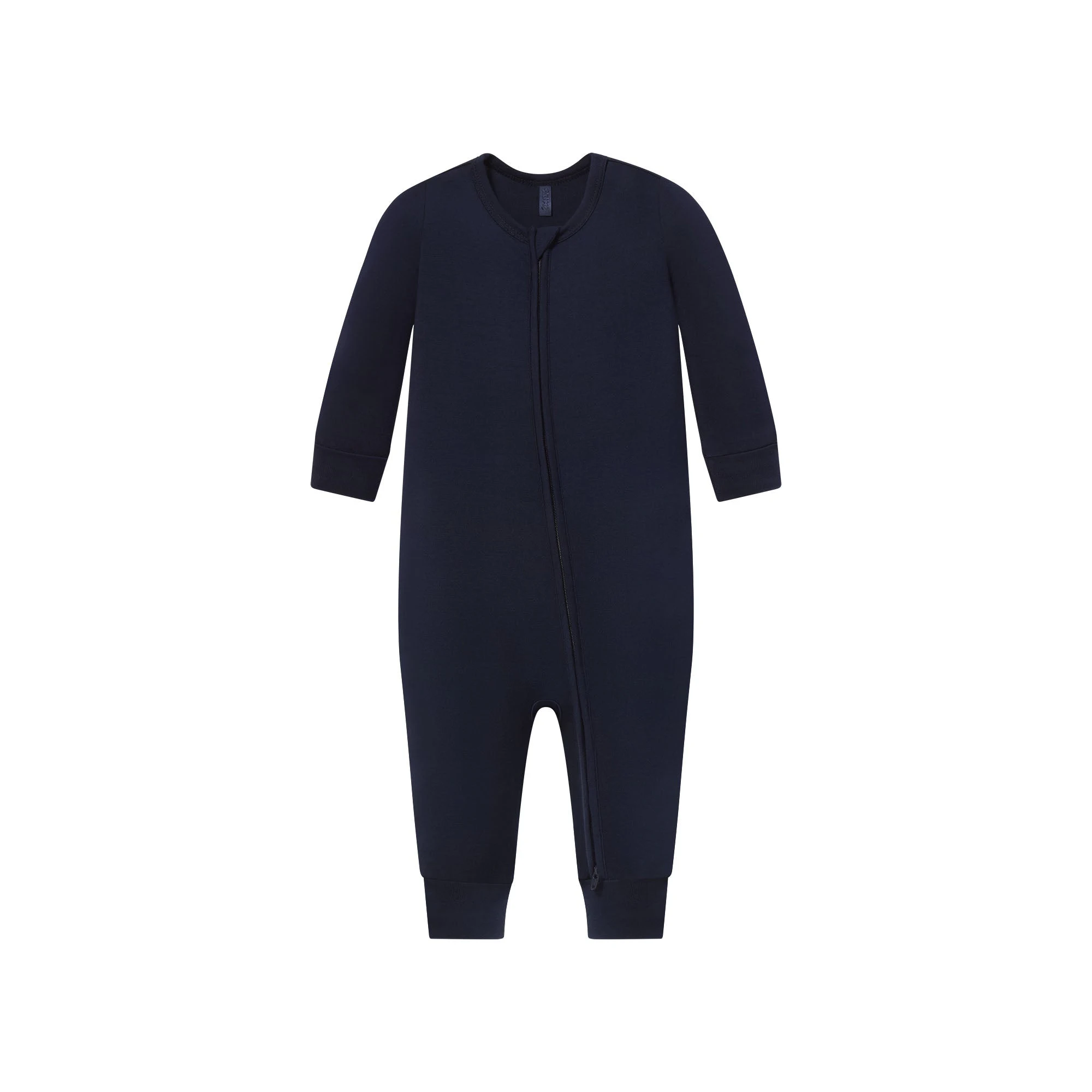 SKIMS SLEEP BABY ONESIE | NAVY FLAT ON A WHITE BACKGROUND @ | FOCUS: 0.0, 1.0, 0.9