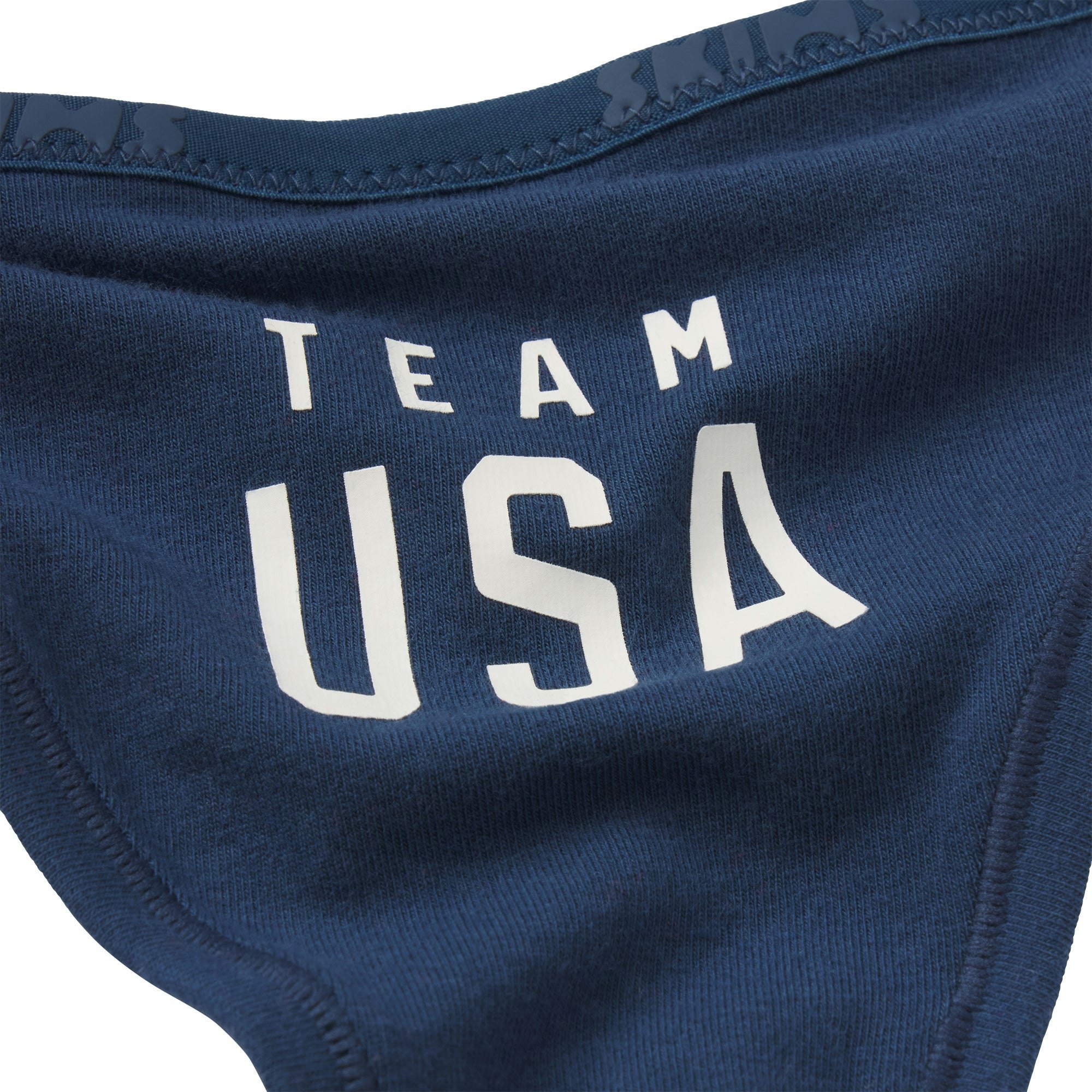 SKIMS FOR TEAM USA COTTON JERSEY PARALYMPIC THONG 3-PACK | SKIMS FOR TEAM USA OLYMPIC MULTION A MODEL FRONT VIEW @ | FOCUS: 0.0, 1.0, 0.9