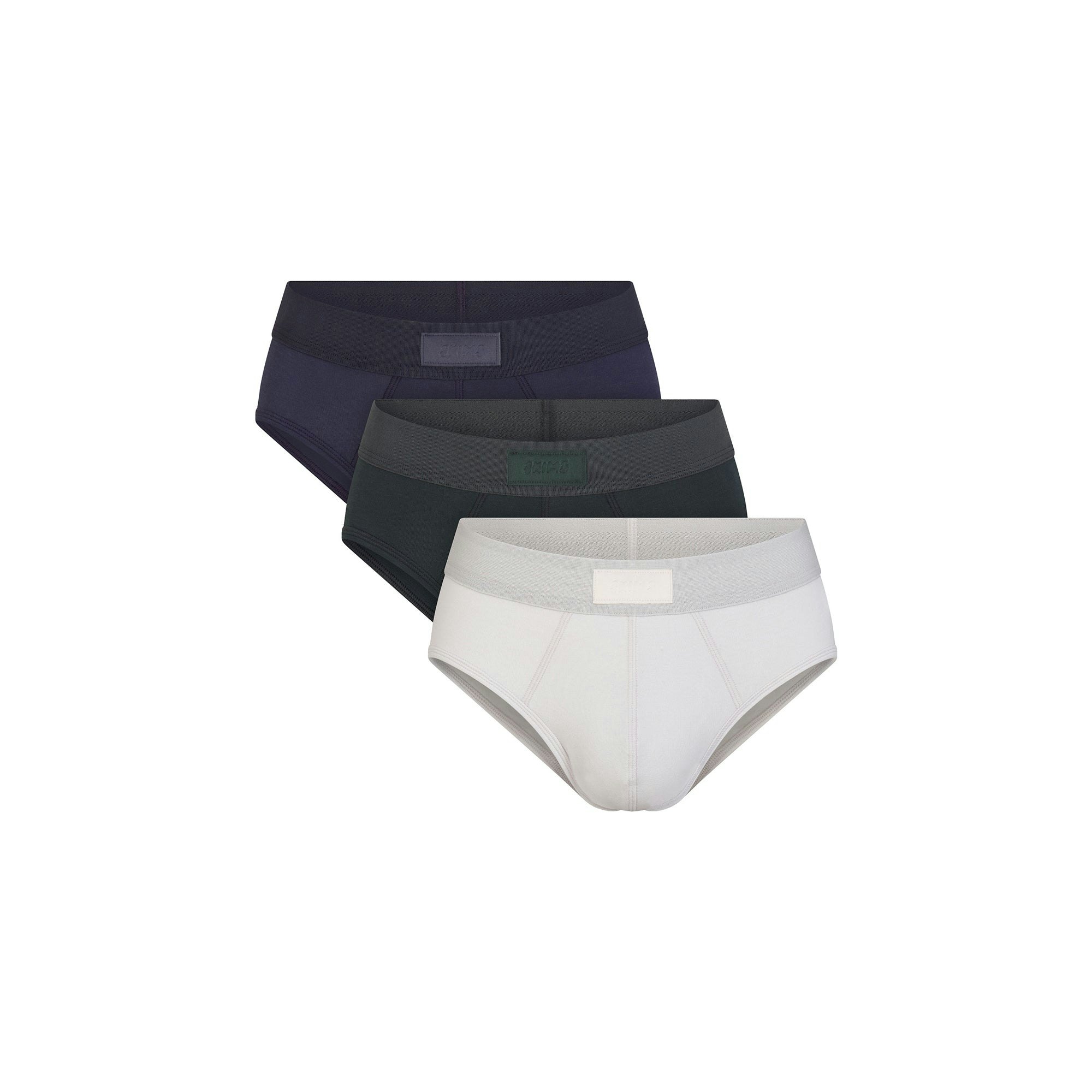 SKIMS COTTON MENS BRIEF 3-PACK | BLUE BLACK MULTI FLAT ON A WHITE BACKGROUND | FOCUS: 0.0, 1.0, 0.9