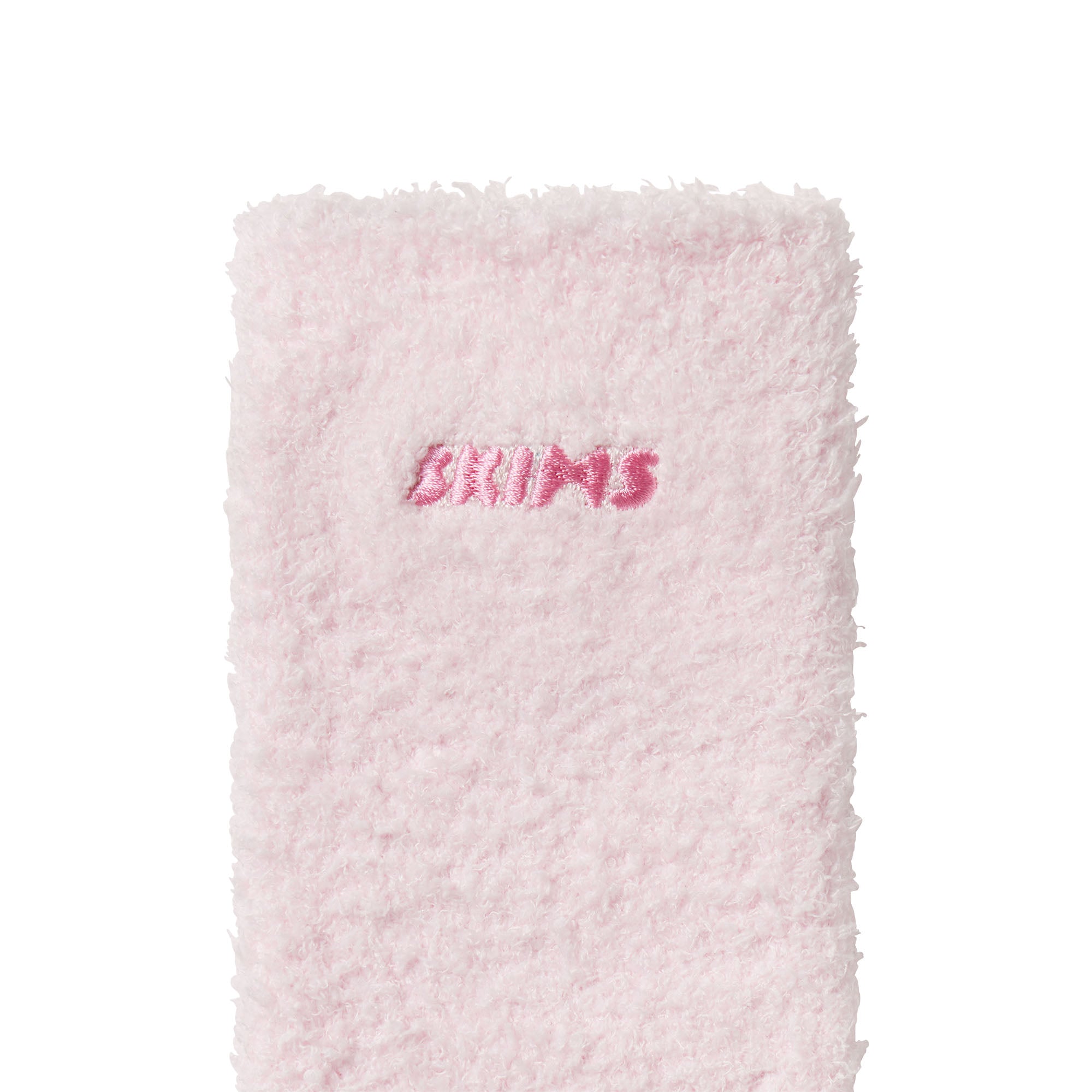COZY LOGO SOCK | CHERRY BLOSSOM ON A MODEL FRONT VIEW @ | FOCUS: 0.0, 1.0, 0.9