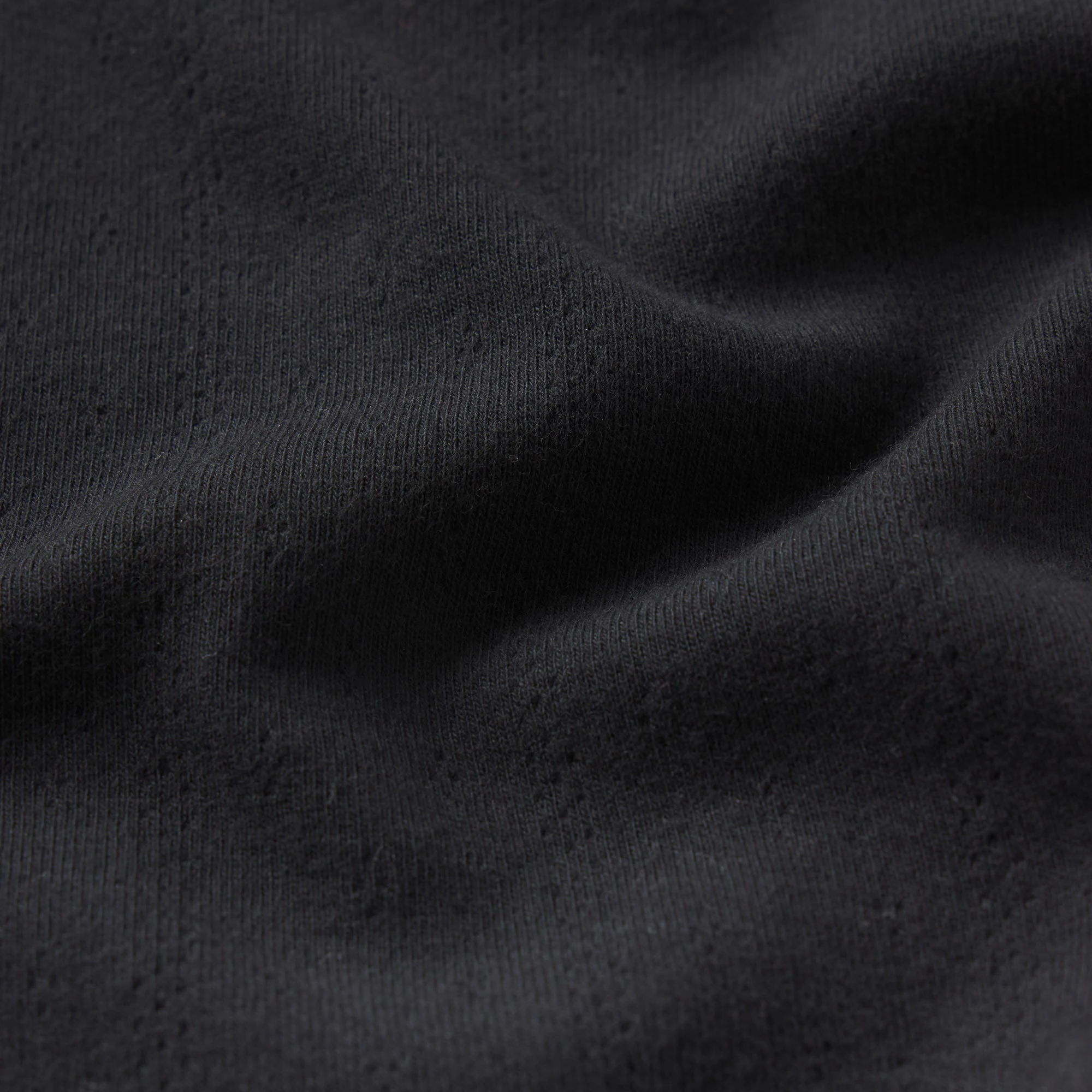 DROP NEEDLE POINTELLE BABY TEE | ONYX ADDITIONAL FABRIC DETAILS