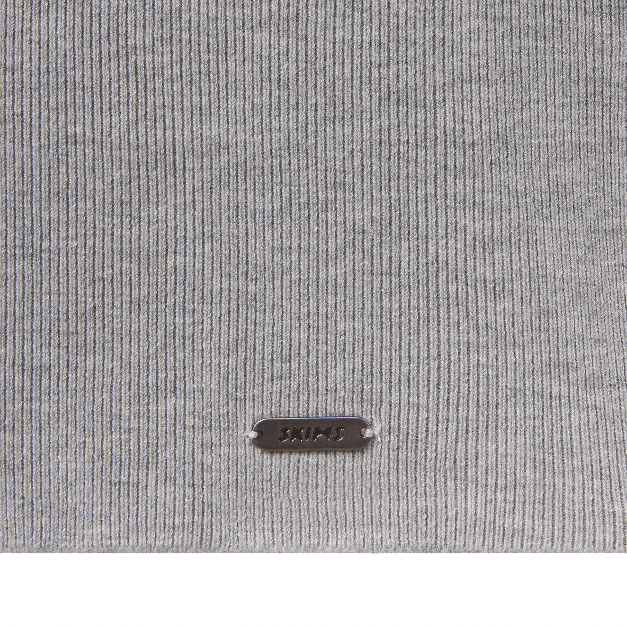 ESSENTIAL SWEATERS ROUNDED CROPPED CARDIGAN | MID HEATHER GREY & LAYS FLAT ON A WHITE BACKGROUND | FLT
