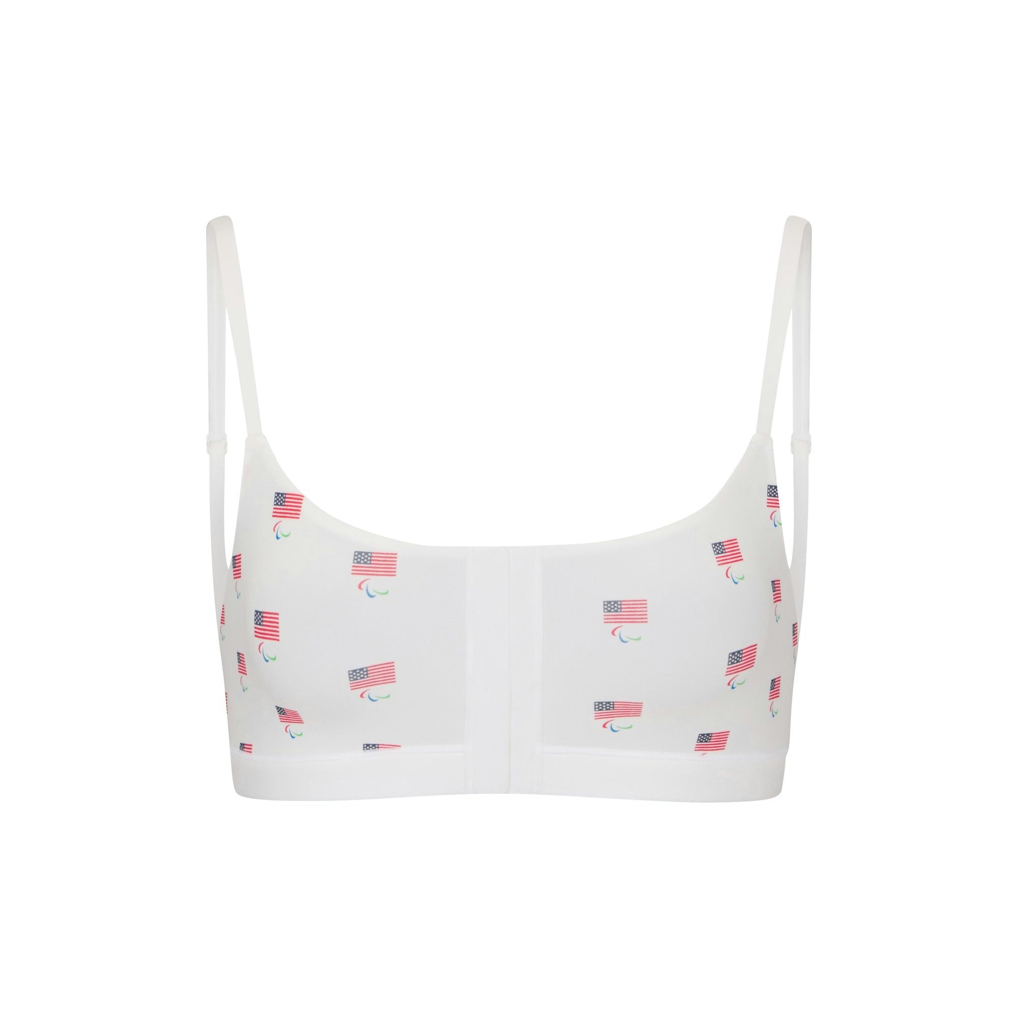 SKIMS FOR TEAM USA FITS EVERYBODY ADAPTIVE  PARALYMPIC SCOOP BRALETTE | WHITE (SCOOP BRALETTES, BRALETTES) FLAT ON A WHITE BACKGROUND | FLT