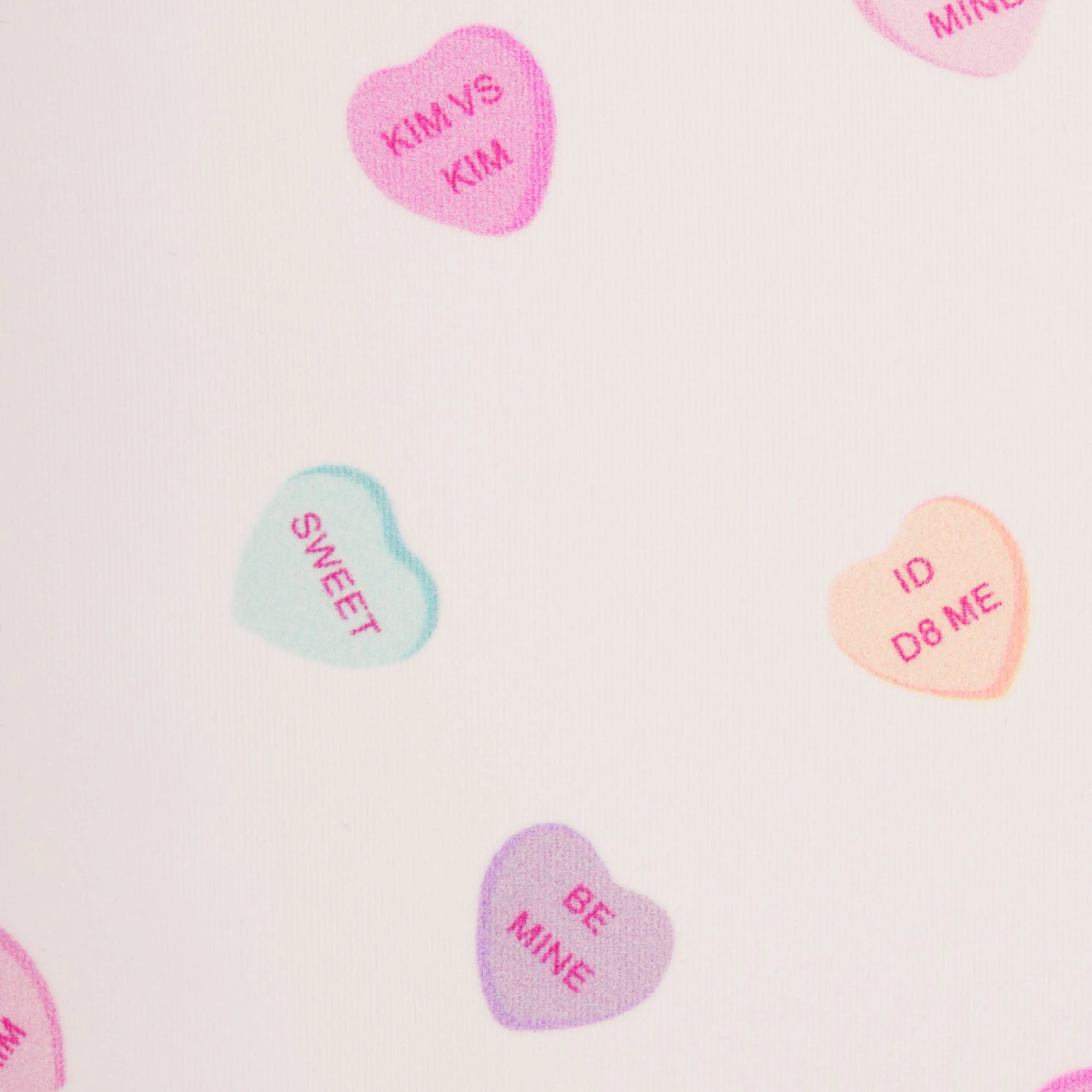 FITS EVERYBODY LACE TRIANGLE CAMI | MARBLE CANDY HEART PRINT ADDITIONAL FABRIC DETAILS | about this fabric 