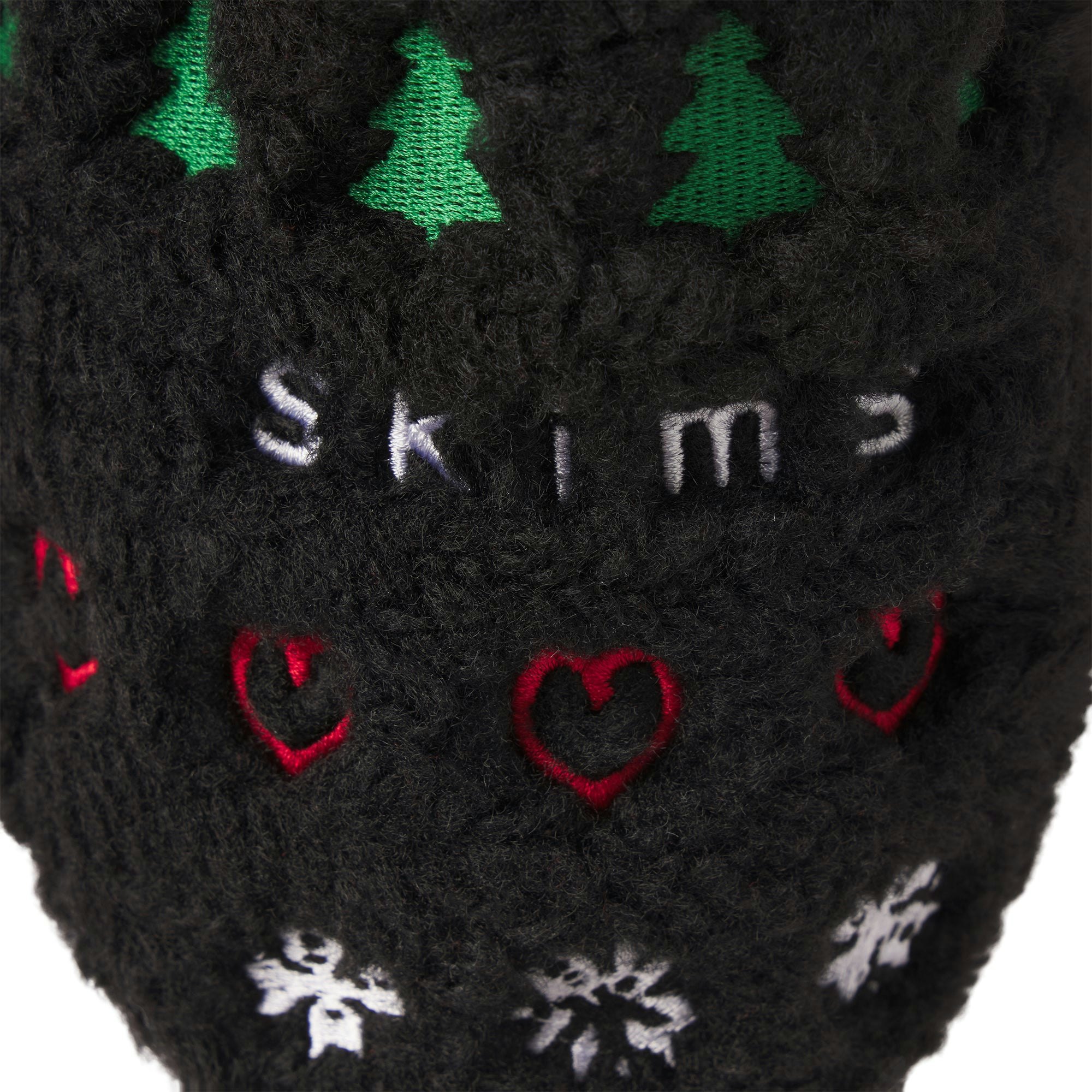 CACTUS PLANT FLEA MARKET X SKIMS SHERPA SLIPPER | ONYX PINE FAIR ISLE FLAT ON A WHITE BACKGROUND