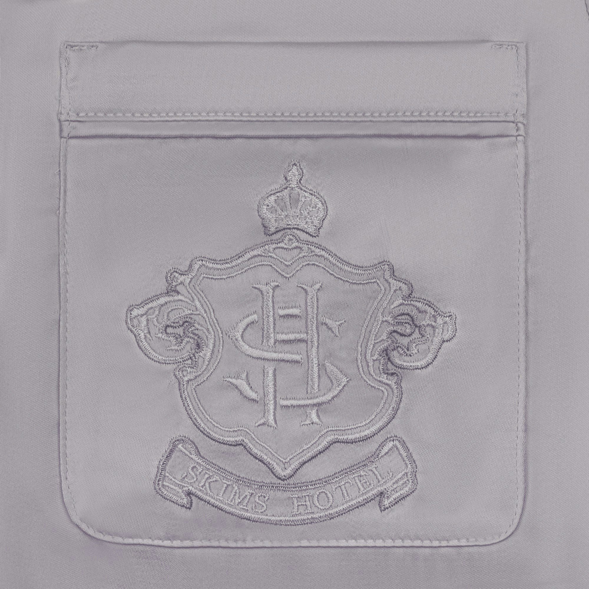 SKIMS HOTEL SHINE ROBE | MIRROR ON A MODEL FRONT VIEW