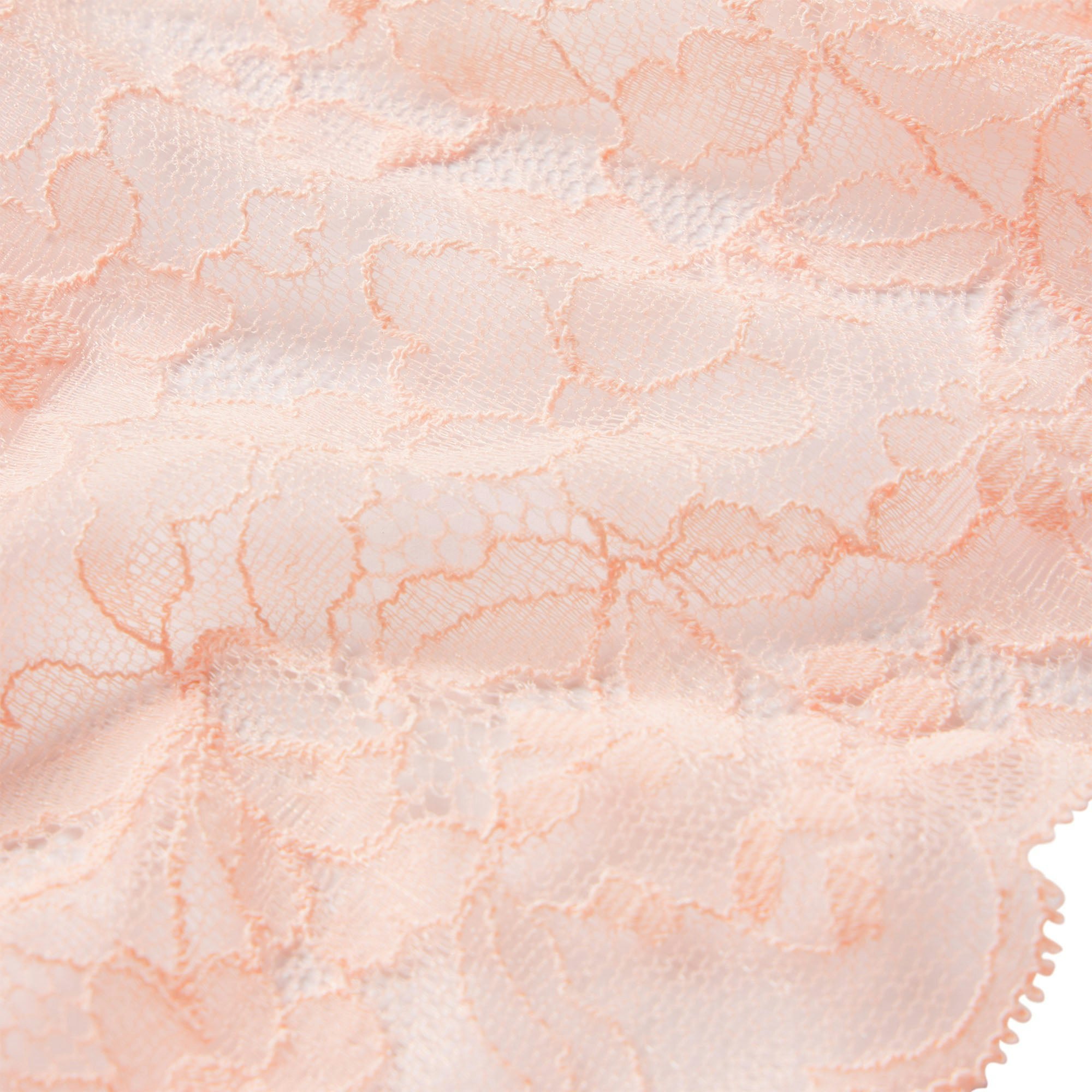 SKIMS LACE THONG | PRIMROSE ON A MODEL FRONT VIEW @ | FOCUS: 0.0, 1.0, 0.9