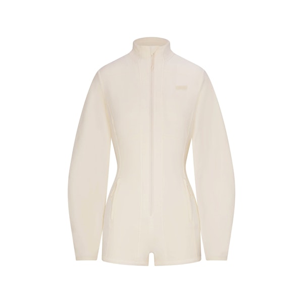 FLEECE LOUNGE ONESIE | ECRU FLAT ON A WHITE BACKGROUND | FLT