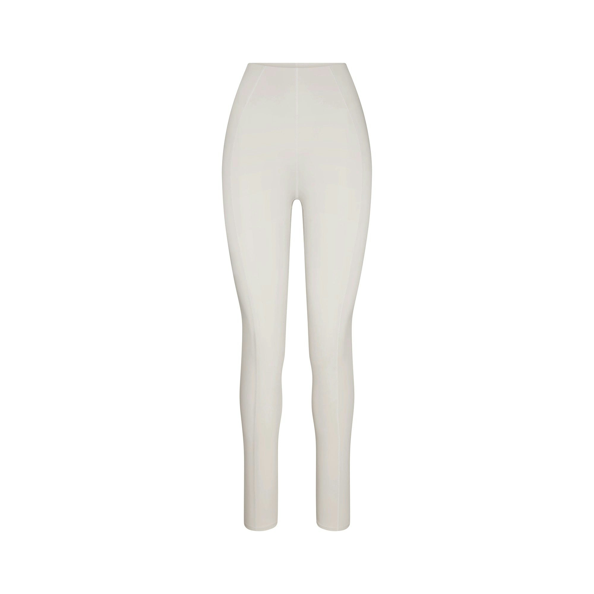 THE NORTH FACE X SKIMS REFINA LEGGING | BONE FLAT ON A WHITE BACKGROUND | FLT