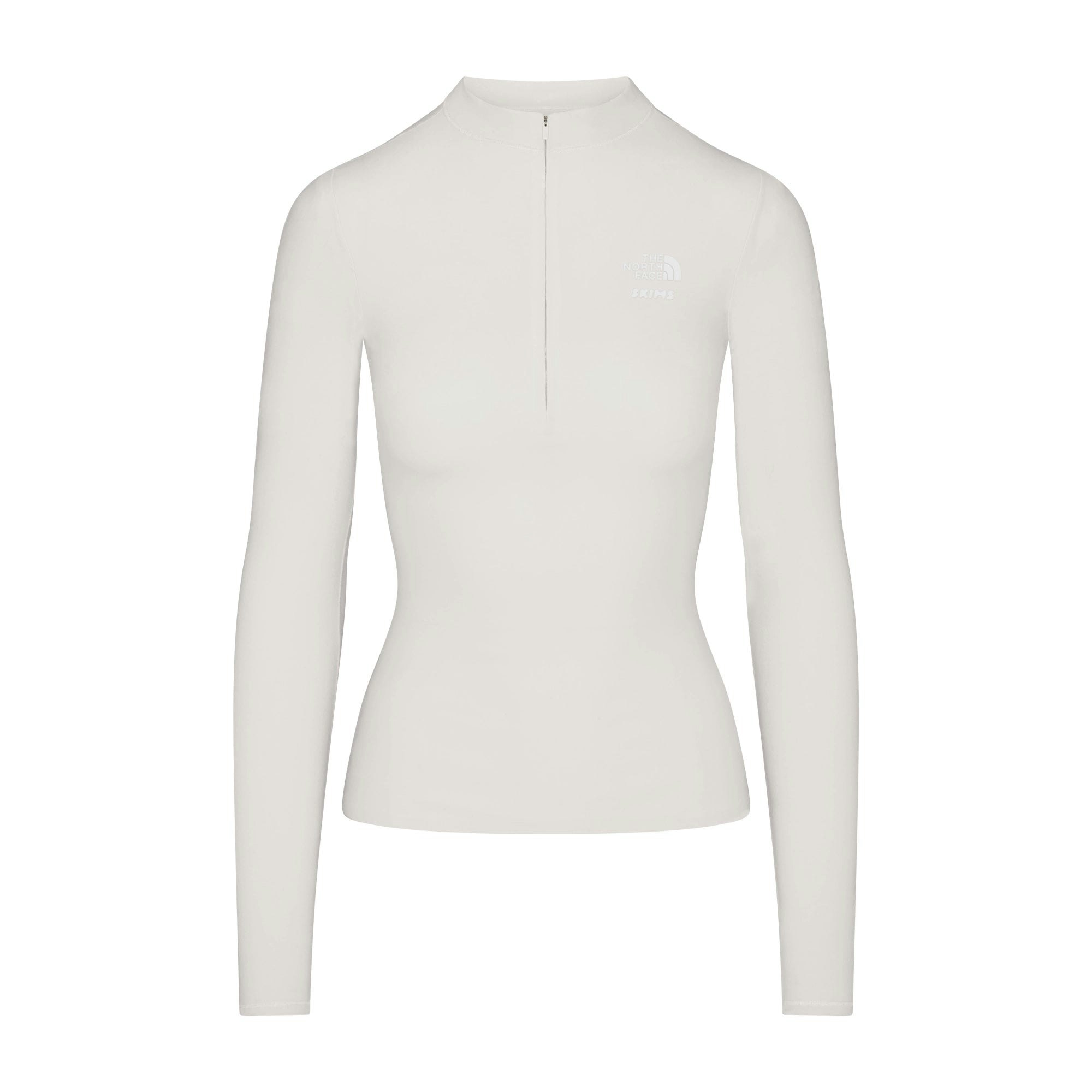 THE NORTH FACE X SKIMS REFINA LONG SLEEVE TOP | BONE FLAT ON A WHITE BACKGROUND | FLT