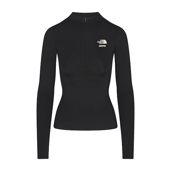 THE NORTH FACE X SKIMS REFINA LONG SLEEVE TOP | ONYX FLAT ON A WHITE BACKGROUND | FLT