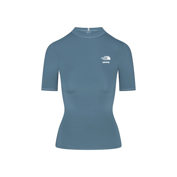 THE NORTH FACE X SKIMS REFINA SHORT SLEEVE TOP | KYANITE FLAT ON A WHITE BACKGROUND | FLT