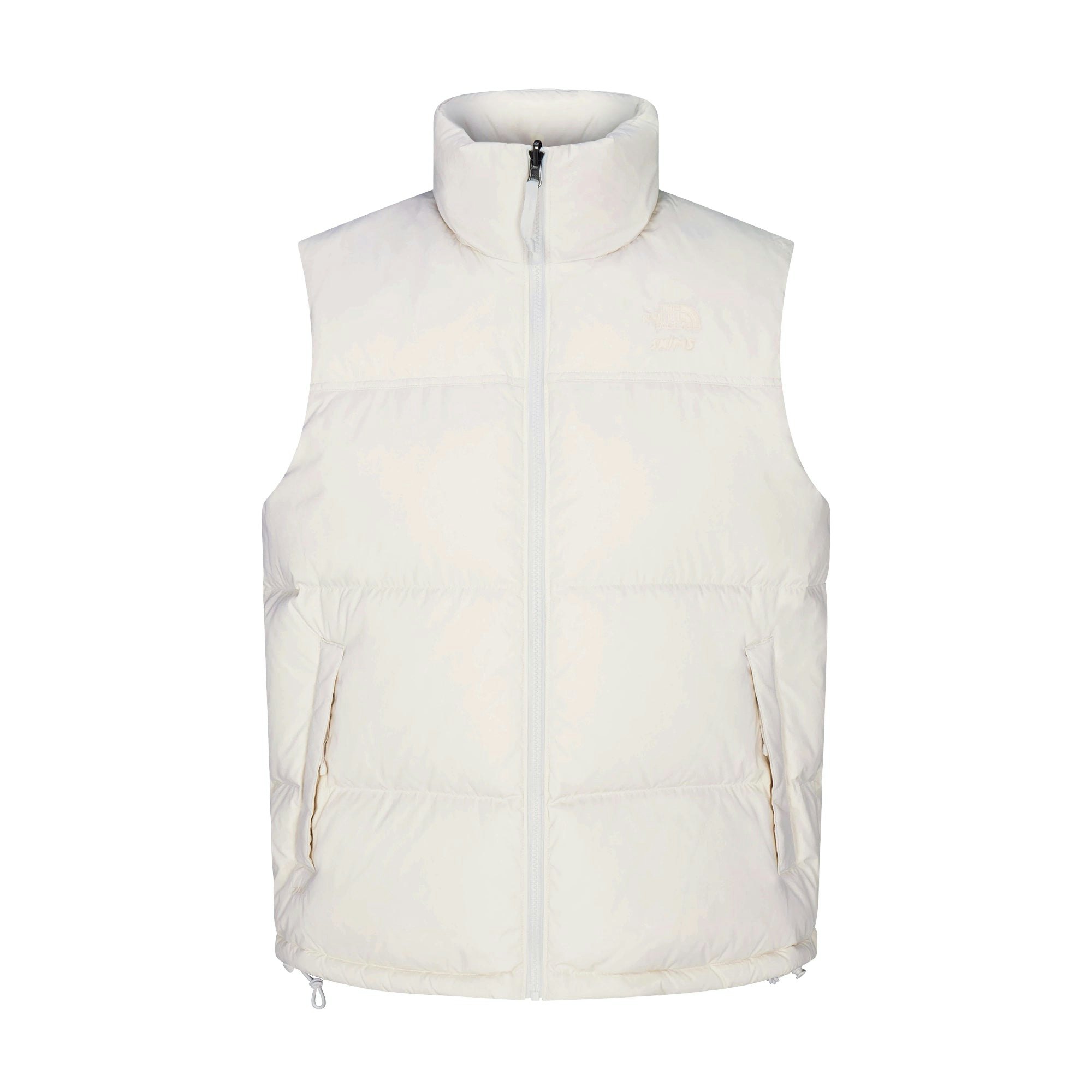 THE NORTH FACE X SKIMS 1996 NUPTSE VEST | BONE FLAT ON A WHITE BACKGROUND | FLT
