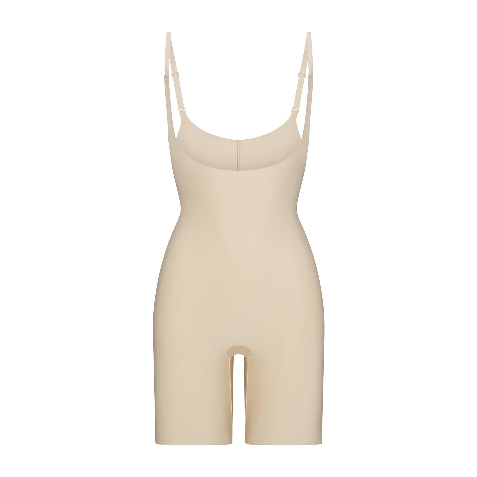 SKIMS BODY BUTT ENHANCING OPEN BUST PADDED BODYSUIT | SAND FLAT ON A WHITE BACKGROUND | FLT | FLT