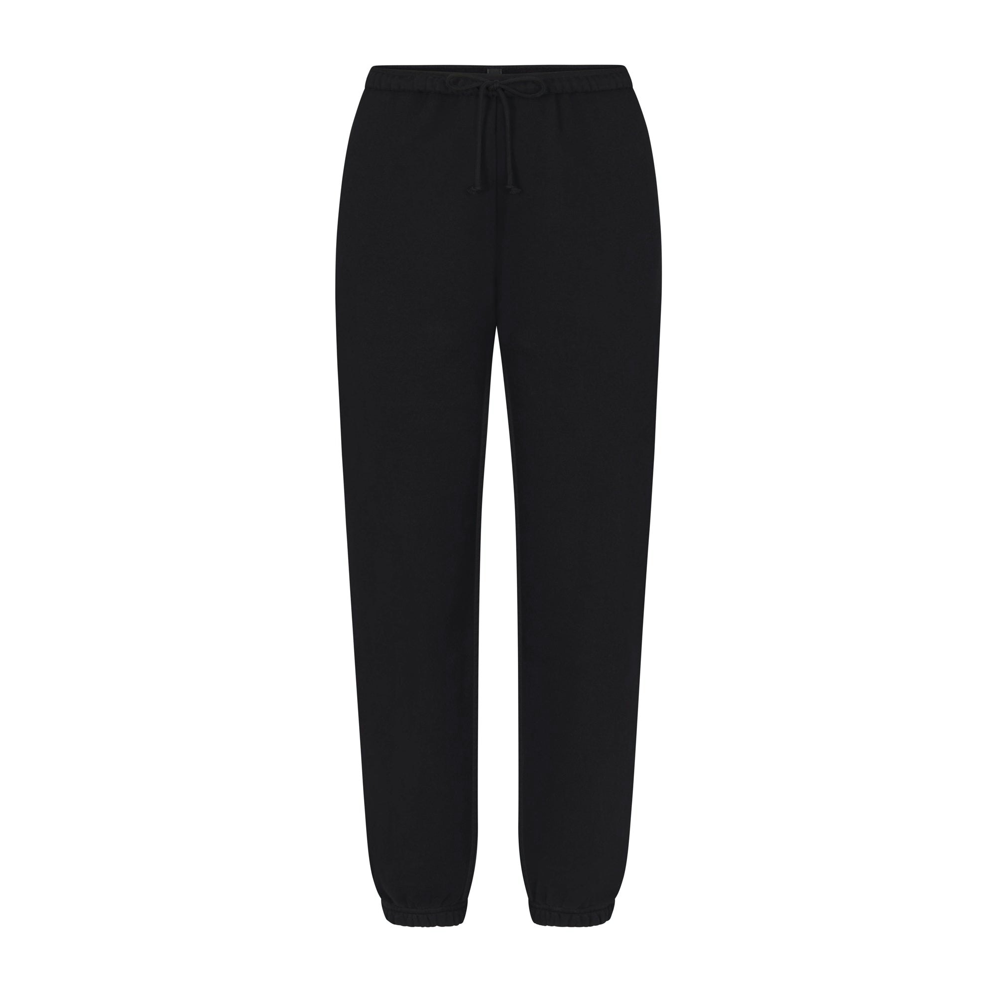 COTTON FLEECE JOGGER LAYS FLAT ON A WHITE BACKGROUND | FLT