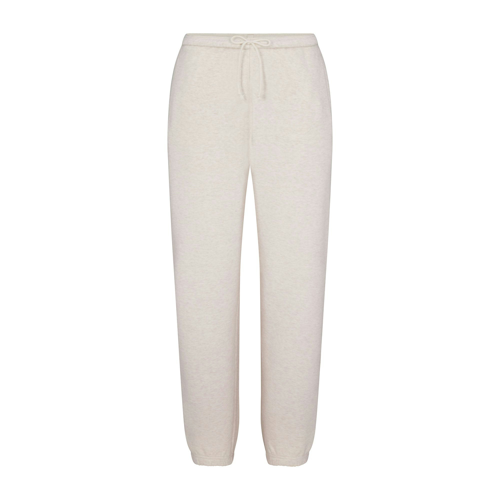 COTTON FLEECE CLASSIC JOGGER | HEATHER OATMEAL FLAT ON A WHITE BACKGROUND | FLT
