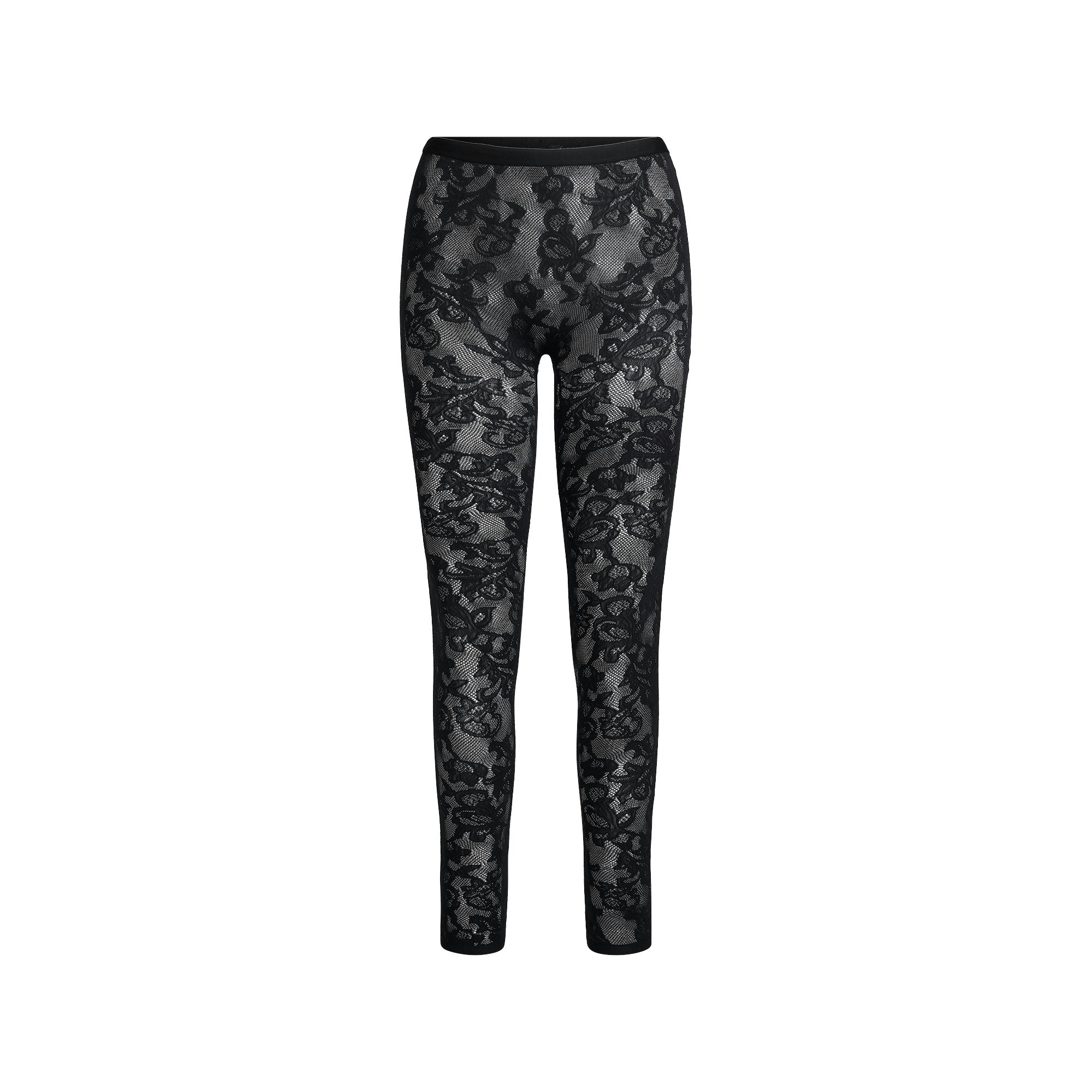 KNIT LACE STIRRUP LEGGING | OBSIDIAN FLAT ON A WHITE BACKGROUND | FLT