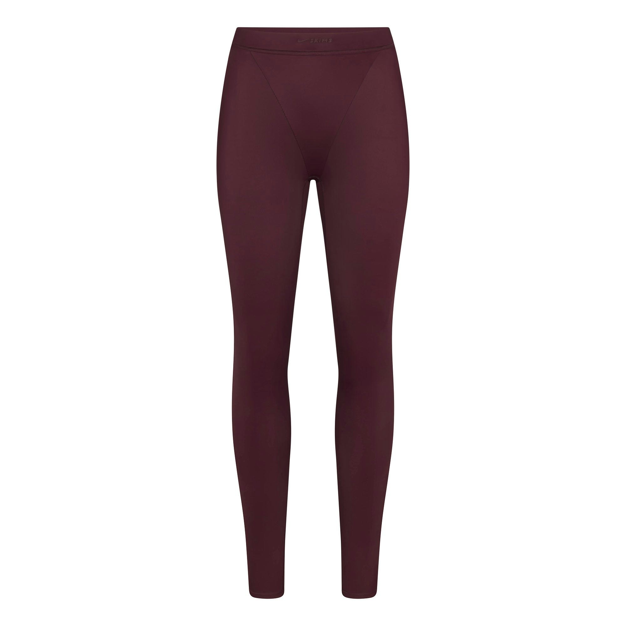 NikeSKIMS SHINE V-LINE 26" LEGGING | CURRANT FLAT ON A WHITE BACKGROUND | FLT