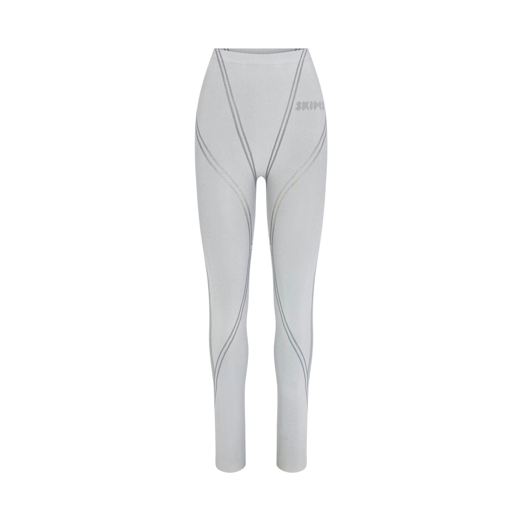 SKIMS FIRST LAYERS LEGGING | MIRROR (LEGGINGS, BOTTOMS) LAYS FLAT ON A WHITE BACKGROUND