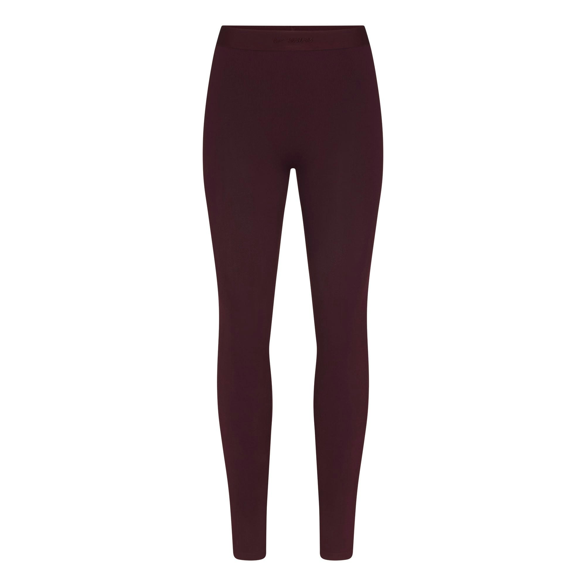 NikeSKIMS VINTAGE SEAMLESS 26" LEGGING | CURRANT FLAT ON A WHITE BACKGROUND | FLT