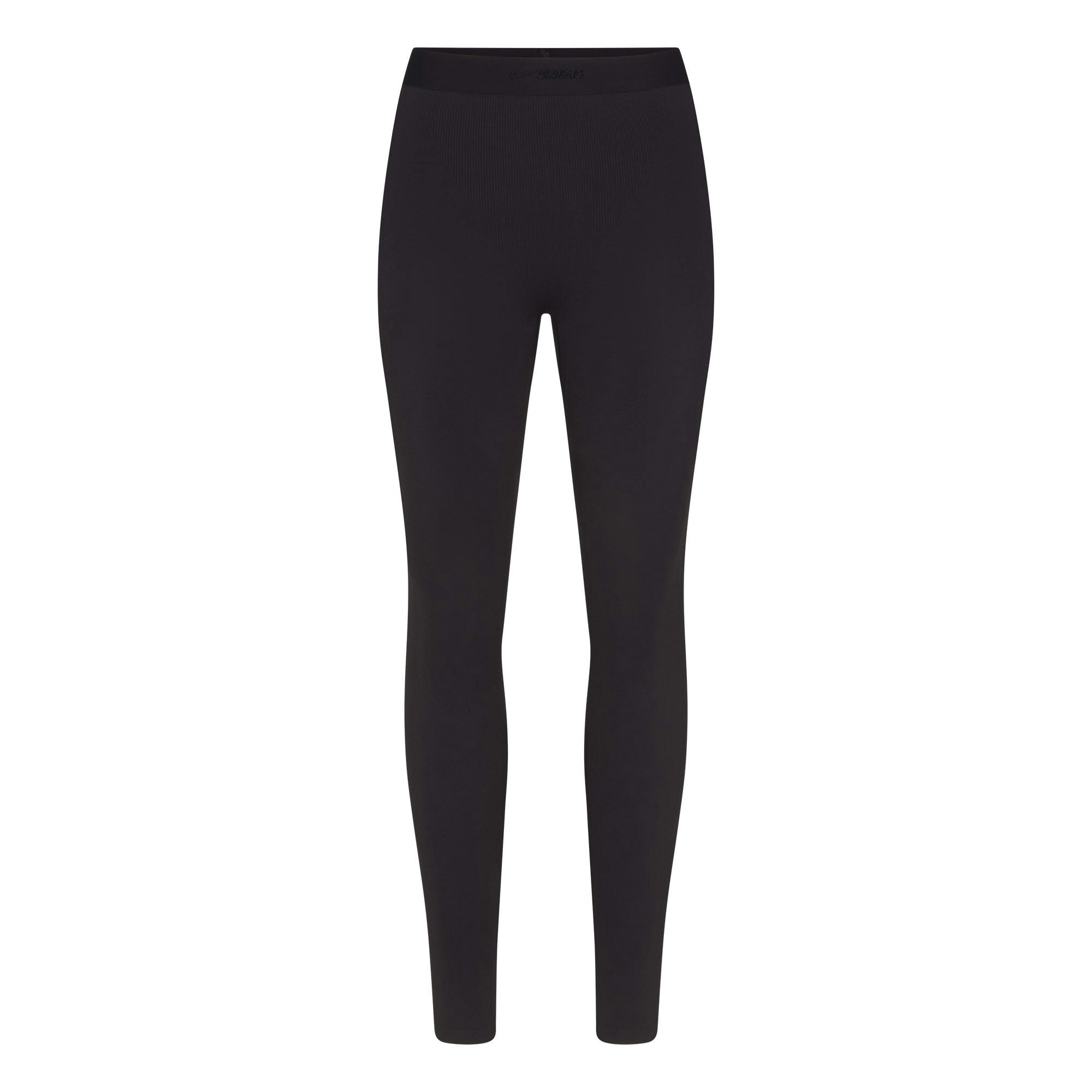 NikeSKIMS VINTAGE SEAMLESS 26" LEGGING | OBSIDIAN FLAT ON A WHITE BACKGROUND | FLT