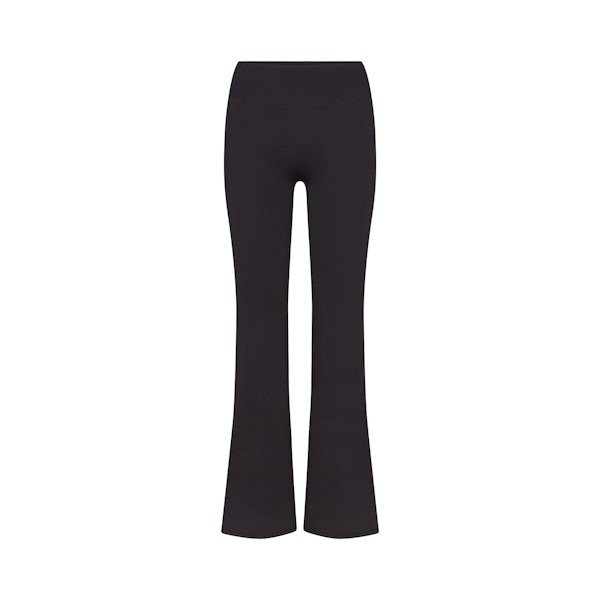 NikeSKIMS MATTE SLIM FLARE LEGGING | OBSIDIAN FLAT ON A WHITE BACKGROUND | FLT