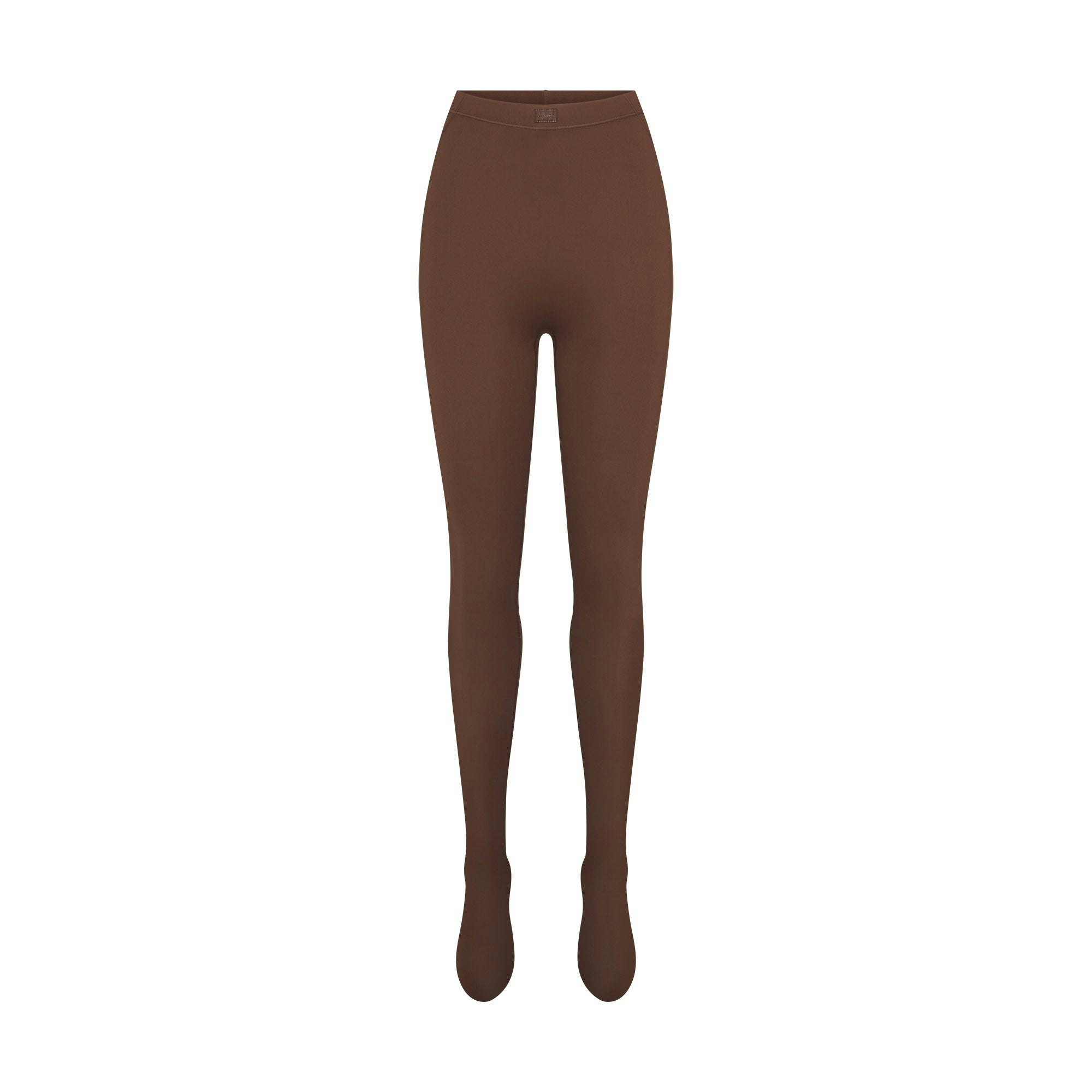 NikeSKIMS MATTE FOOTSIE GRIP LEGGING | DARK SEPIA FLAT ON A WHITE BACKGROUND | FLT
