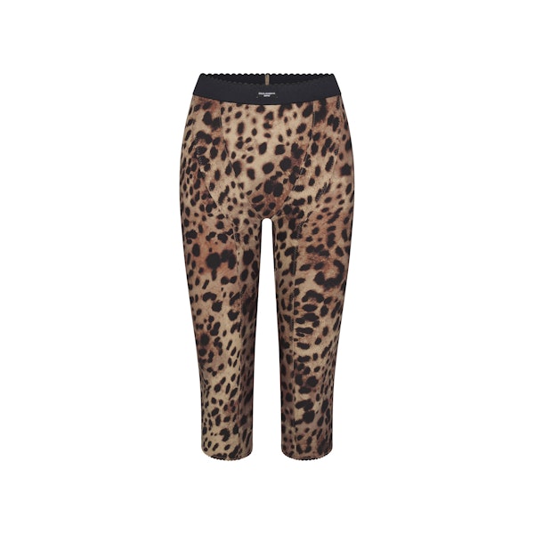 DOLCE&GABBANA X SKIMS SKIMS BODY CAPRI | LEOPARD (CAPRIS) FLAT ON A WHITE BACKGROUND | FLT
