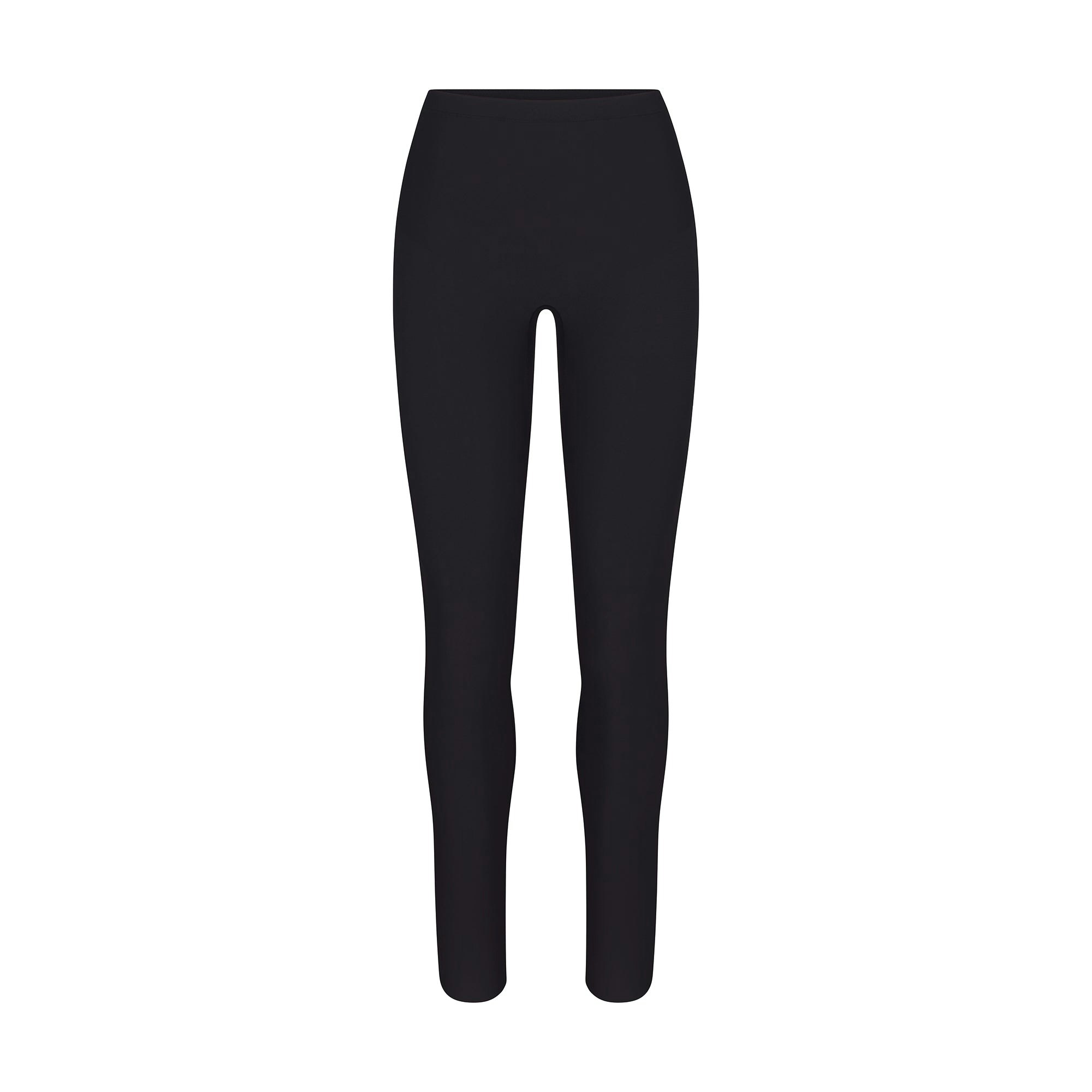 SKIMS BODY CORE SCULPT LEGGING | ONYX FLAT ON A WHITE BACKGROUND | FLT | FLT