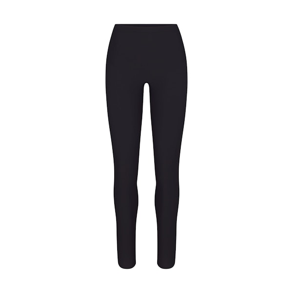 SKIMS BODY CORE SCULPT LEGGING | ONYX FLAT ON A WHITE BACKGROUND | FLT | FLT