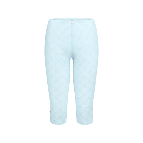 SPRING INTIMATES CAPRI | POWDER BLUE BOW TULLE FLAT ON A WHITE BACKGROUND | FLT