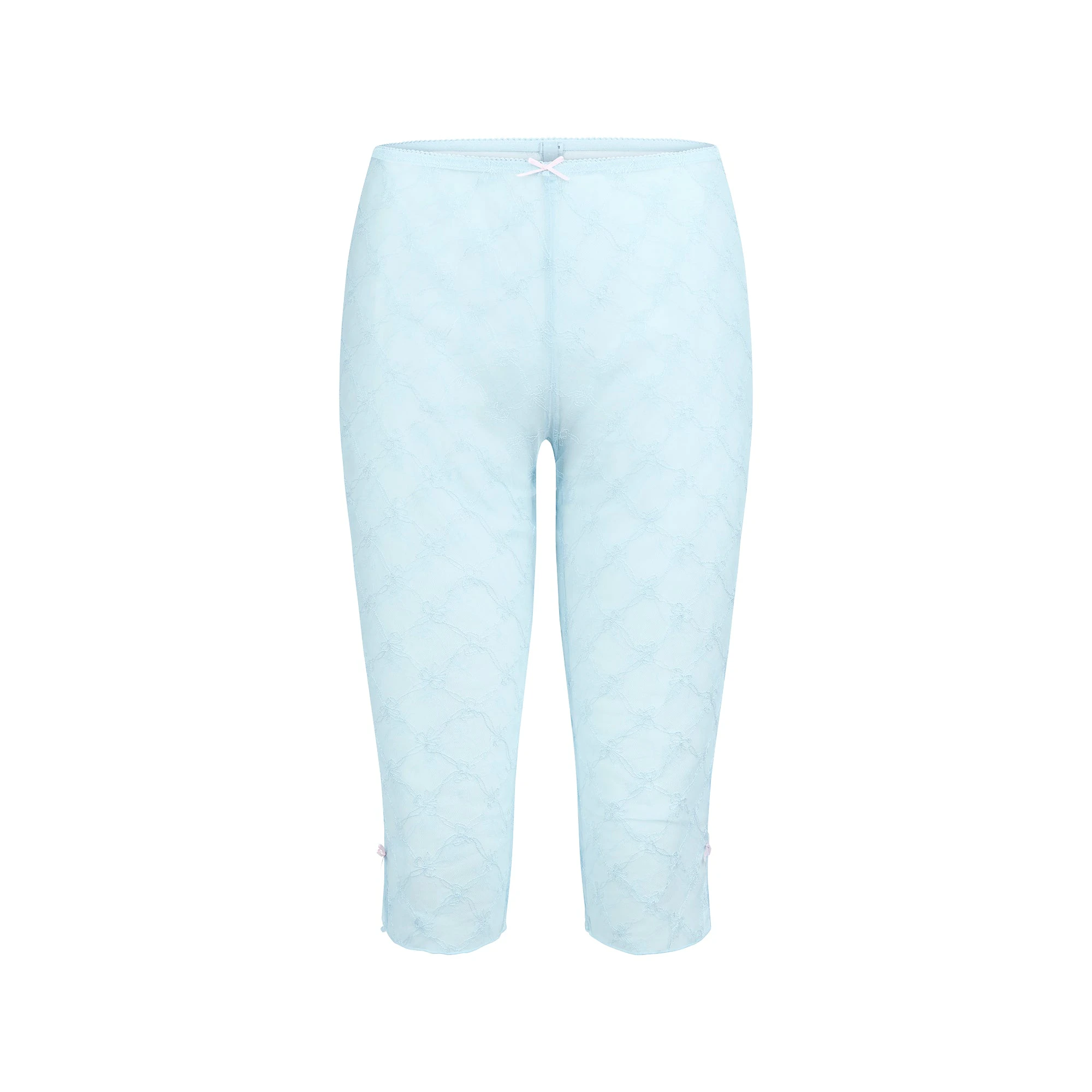 SPRING INTIMATES CAPRI | POWDER BLUE BOW TULLE FLAT ON A WHITE BACKGROUND | FLT