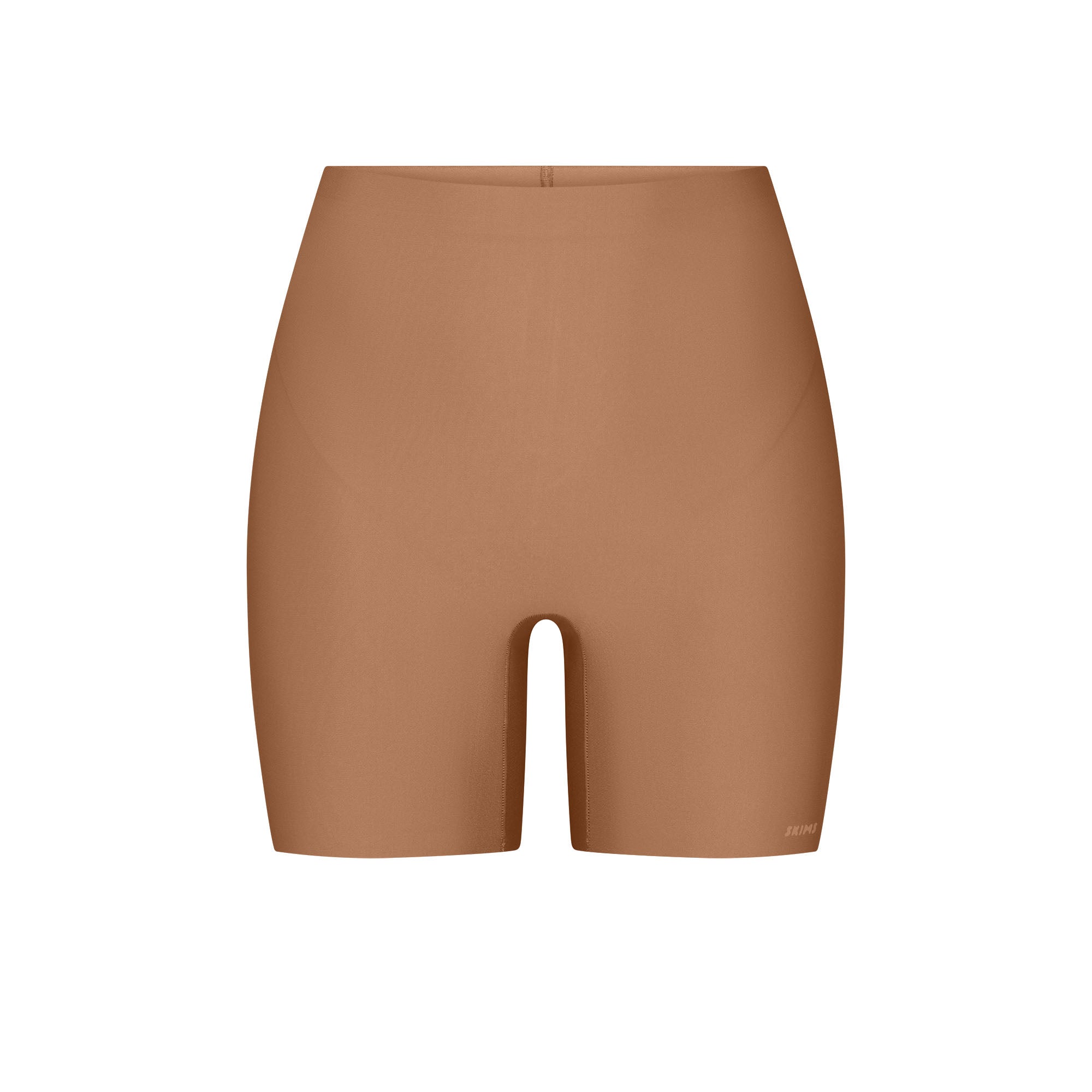 SKIMS BODY CORE SCULPT SHORTIE | SIENNA FLAT ON A WHITE BACKGROUND | FLT
