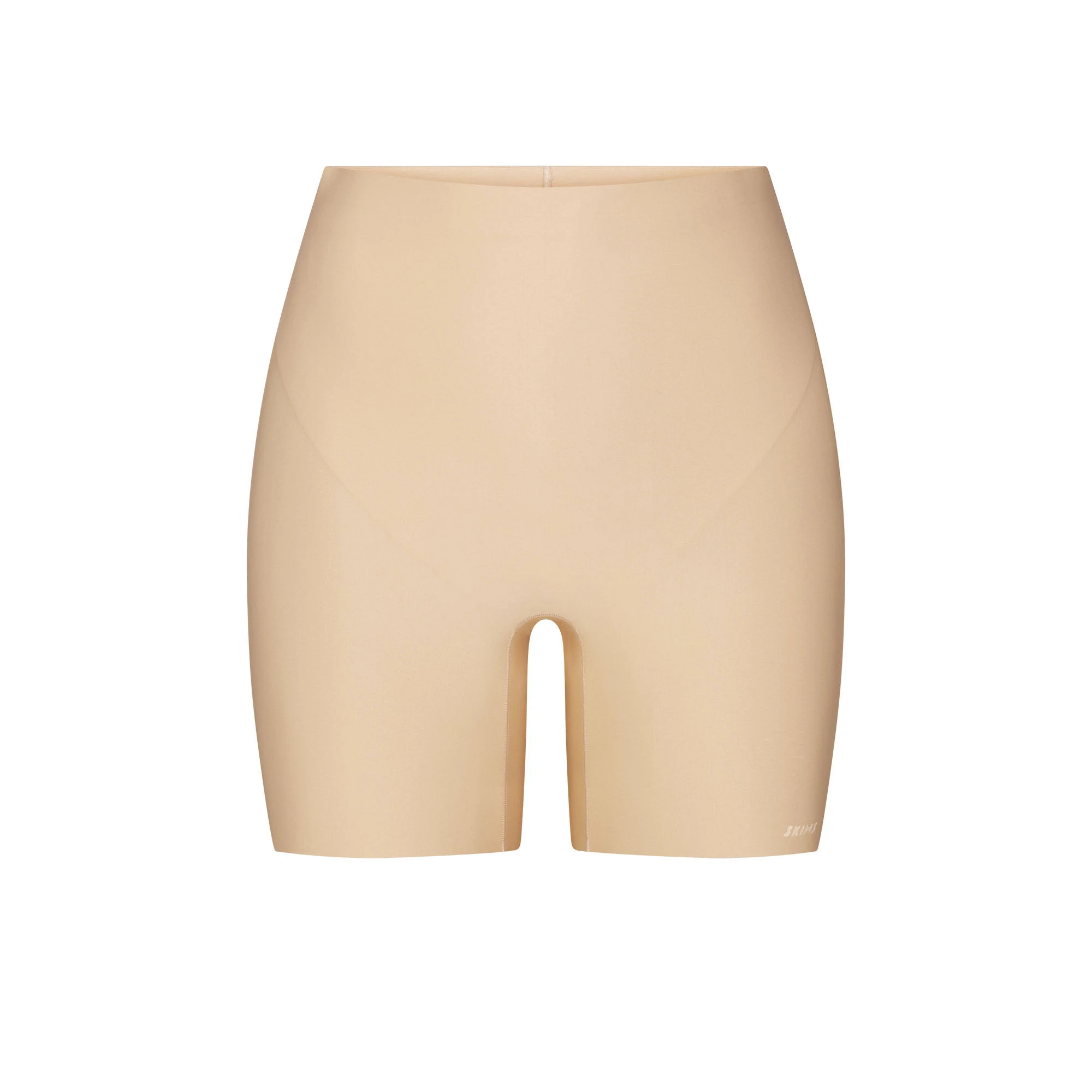 SKIMS BODY CORE SCULPT SHORTIE | SAND FLAT ON A WHITE BACKGROUND | FLT