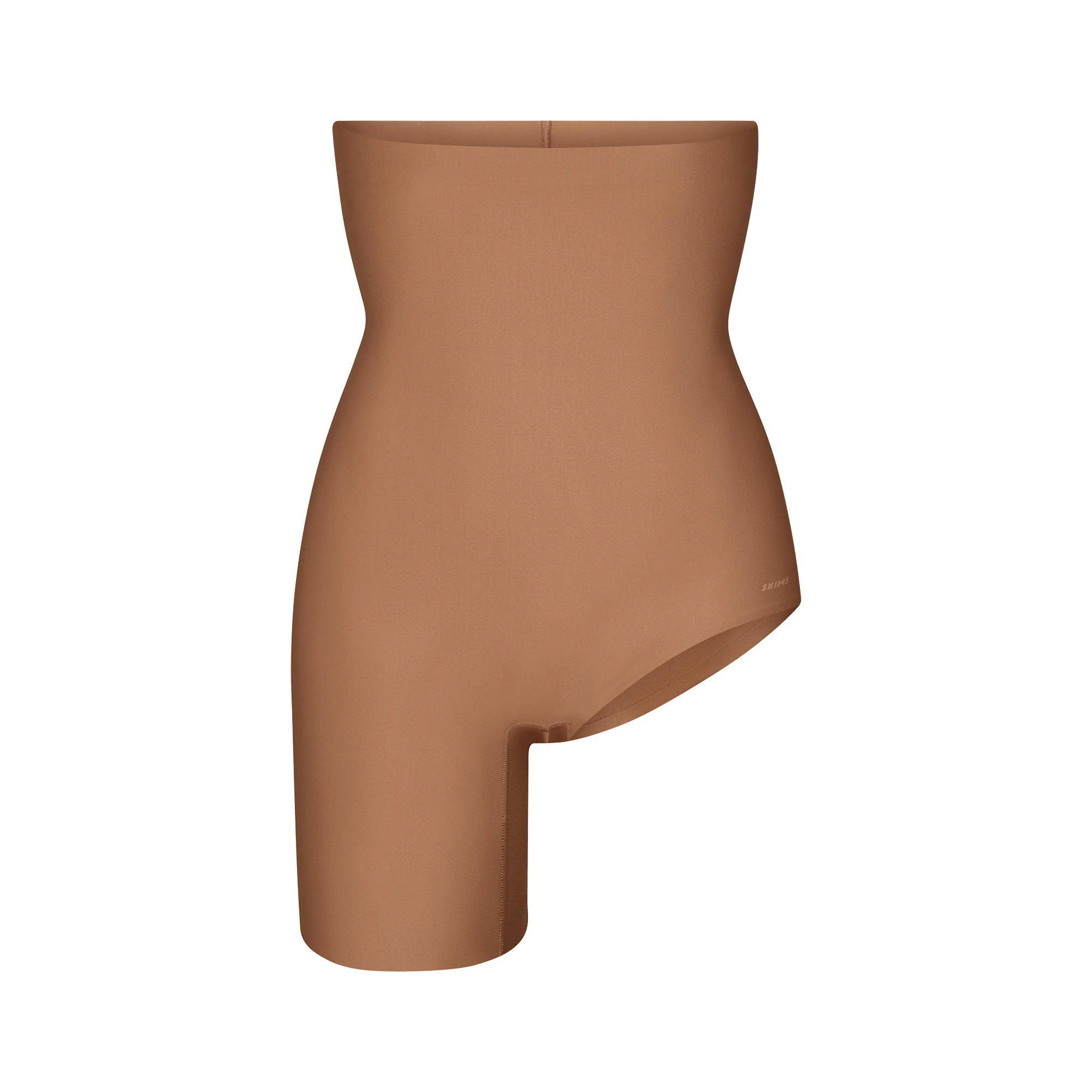 SKIMS BODY LEFT LEG SOLUTION SHORT | SIENNA FLAT ON A WHITE BACKGROUND | FLT