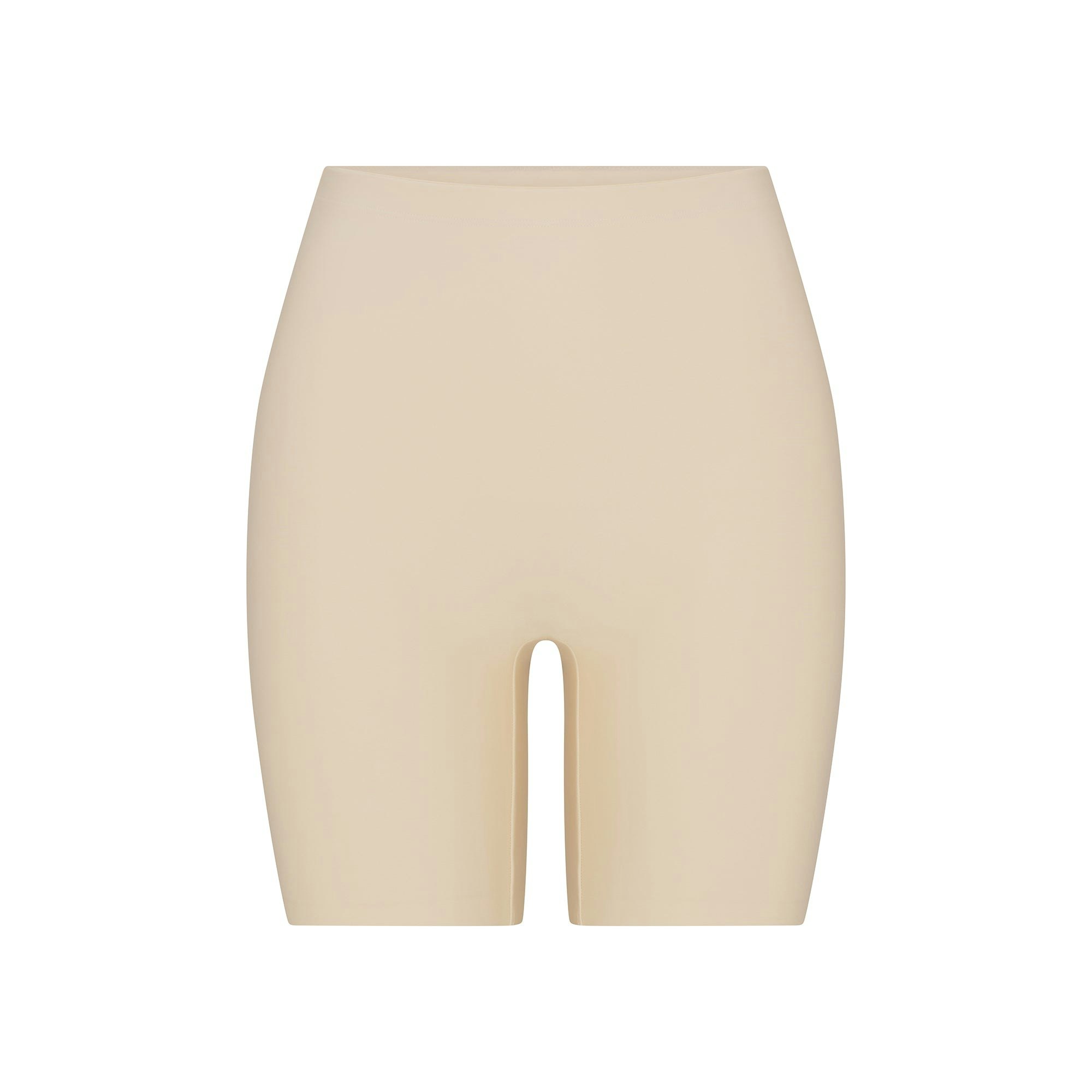SKIMS BODY BUTT ENHANCING PADDED SHORT | SAND FLAT ON A WHITE BACKGROUND | FLT | FLT